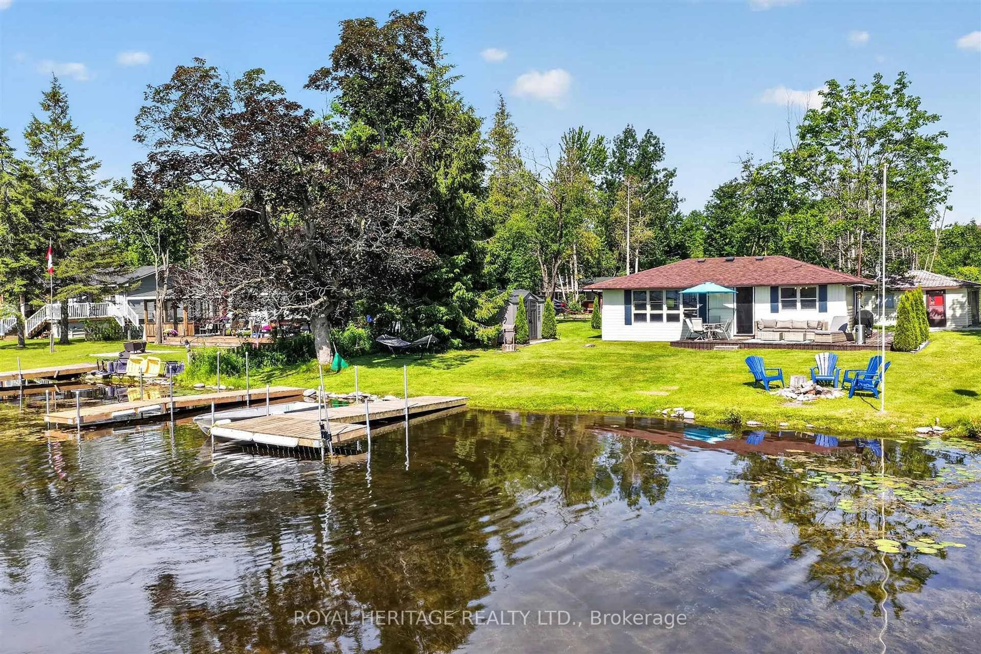 A pic from outside/outdoor area/front of a property/back of a property/a pic from drone, water/lake/river/ocean view for 100 Clearview Dr, Kawartha Lakes Ontario K0L 2W0