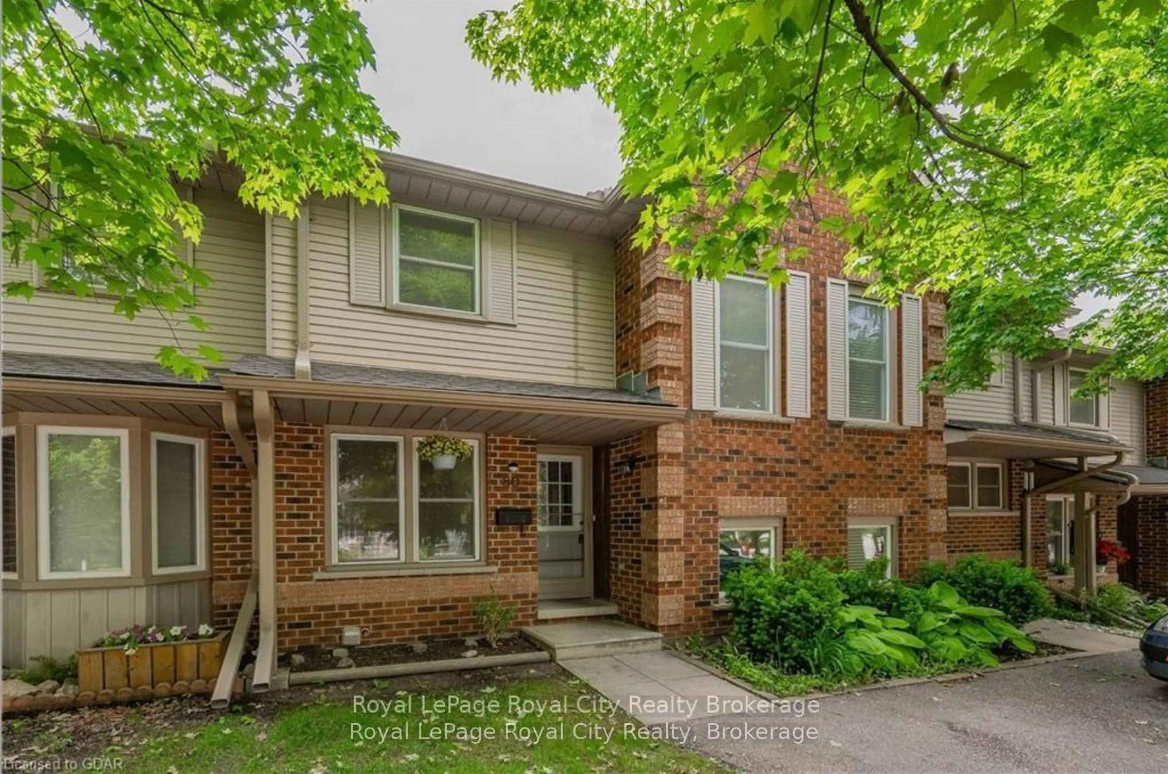 Home with brick exterior material, street for 180 MARKSAM Rd #80, Guelph Ontario N1H 8G6