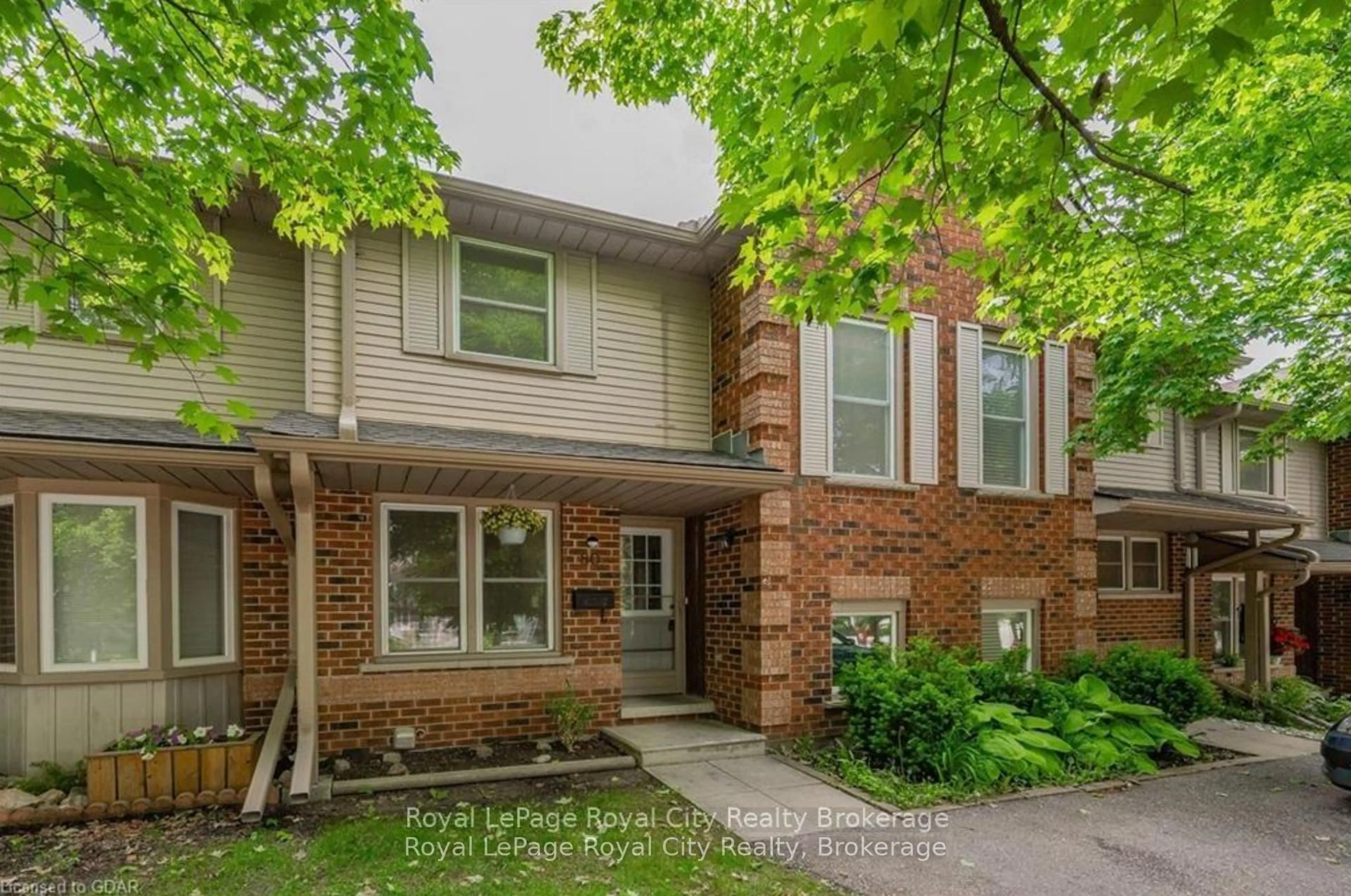 Home with brick exterior material, street for 180 MARKSAM Rd #80, Guelph Ontario N1H 8G6