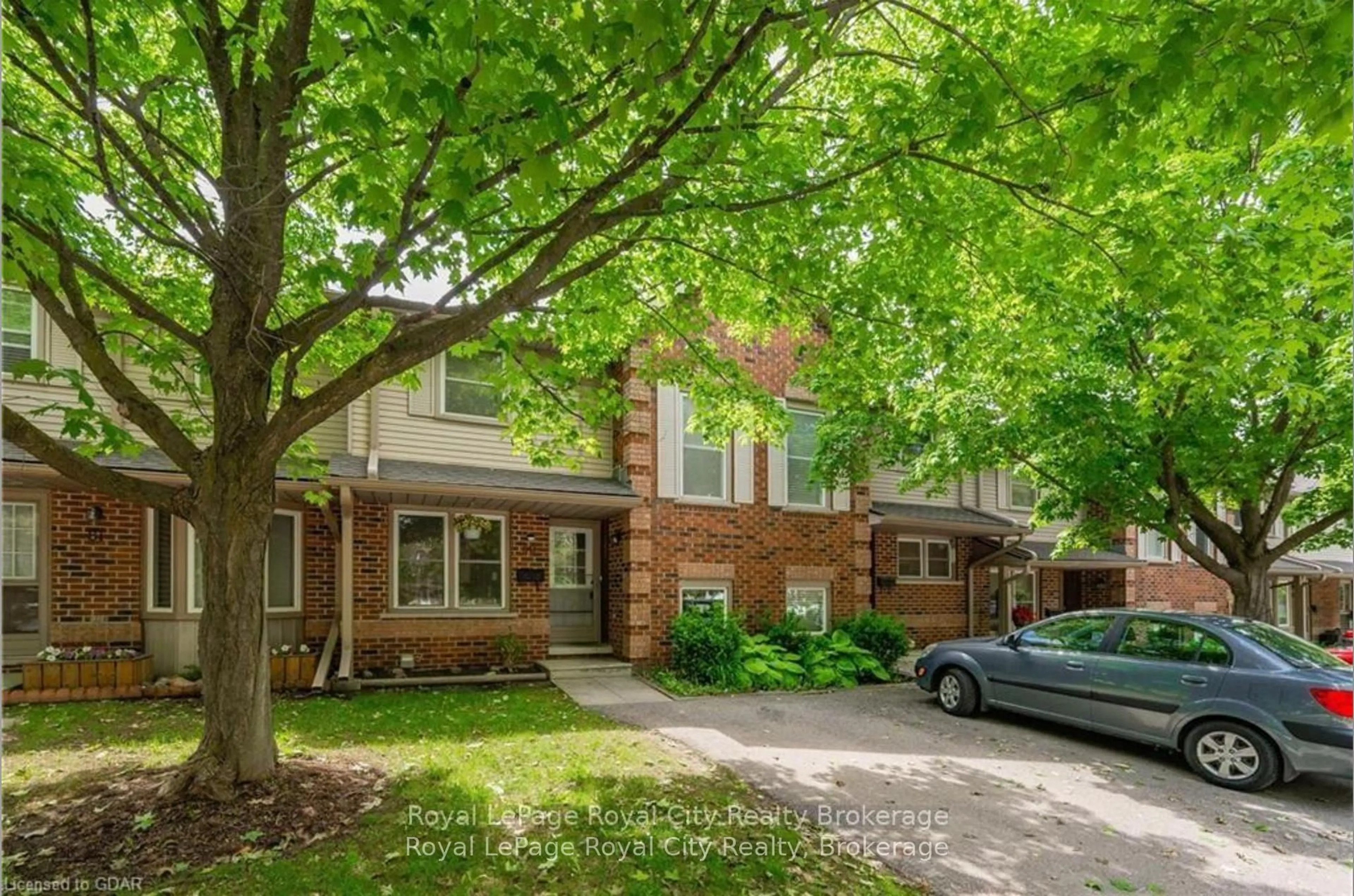 Home with brick exterior material, street for 180 MARKSAM Rd #80, Guelph Ontario N1H 8G6