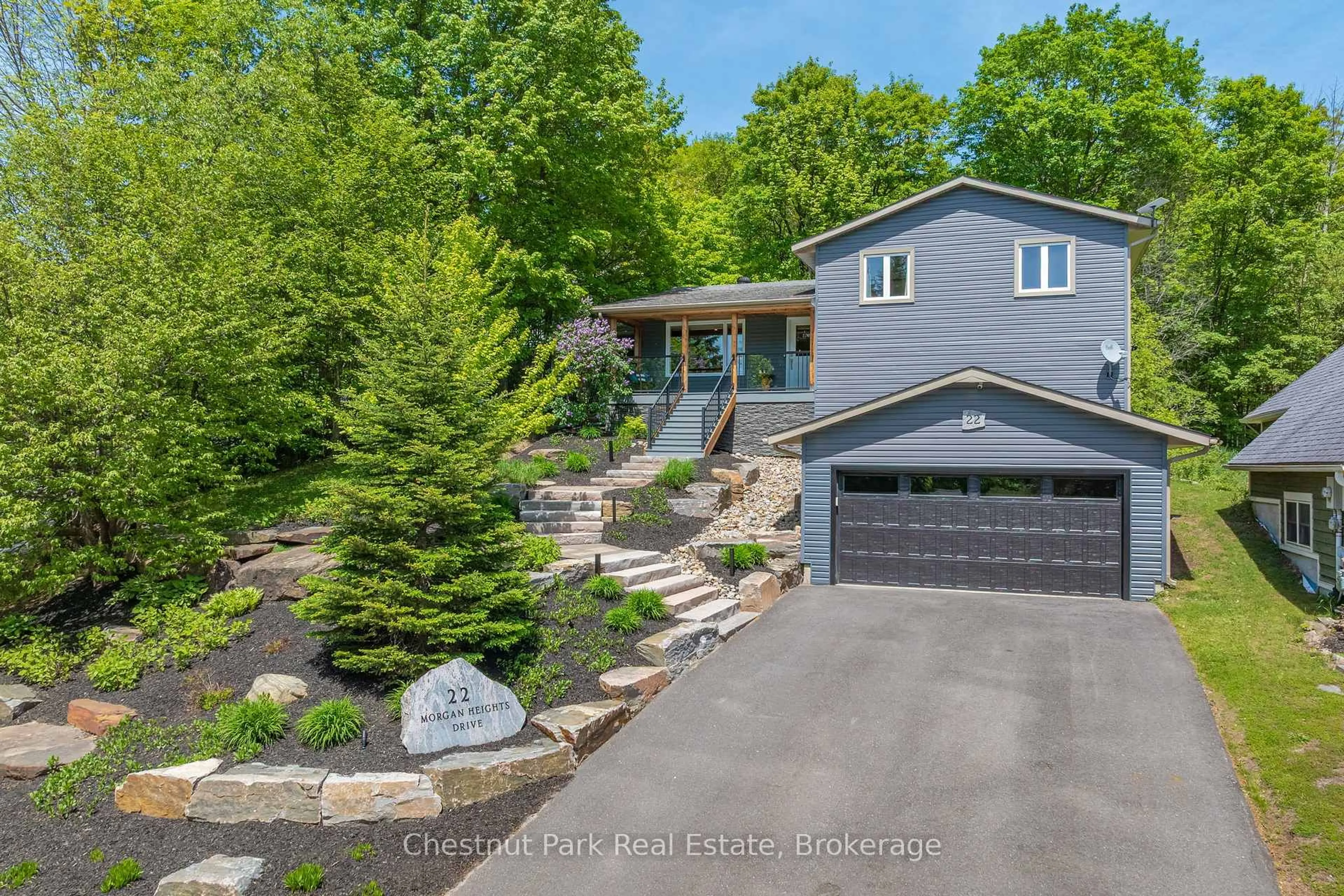 A pic from outside/outdoor area/front of a property/back of a property/a pic from drone, water/lake/river/ocean view for 22 Morgan Heights Dr, Huntsville Ontario P1H 1B7