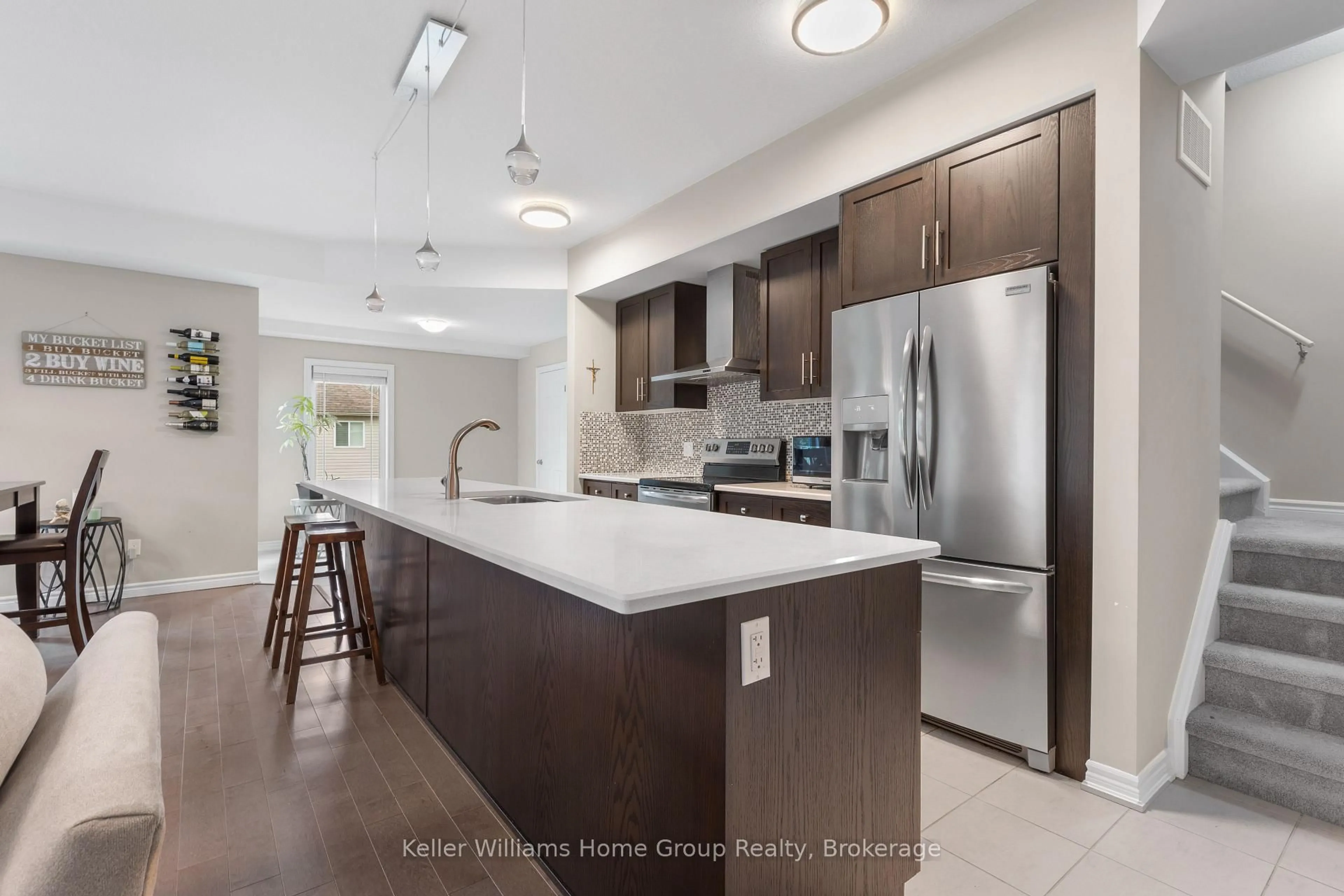 Open concept kitchen, ceramic/tile floor for 107 Westra Dr #35, Guelph Ontario N1K 0A5