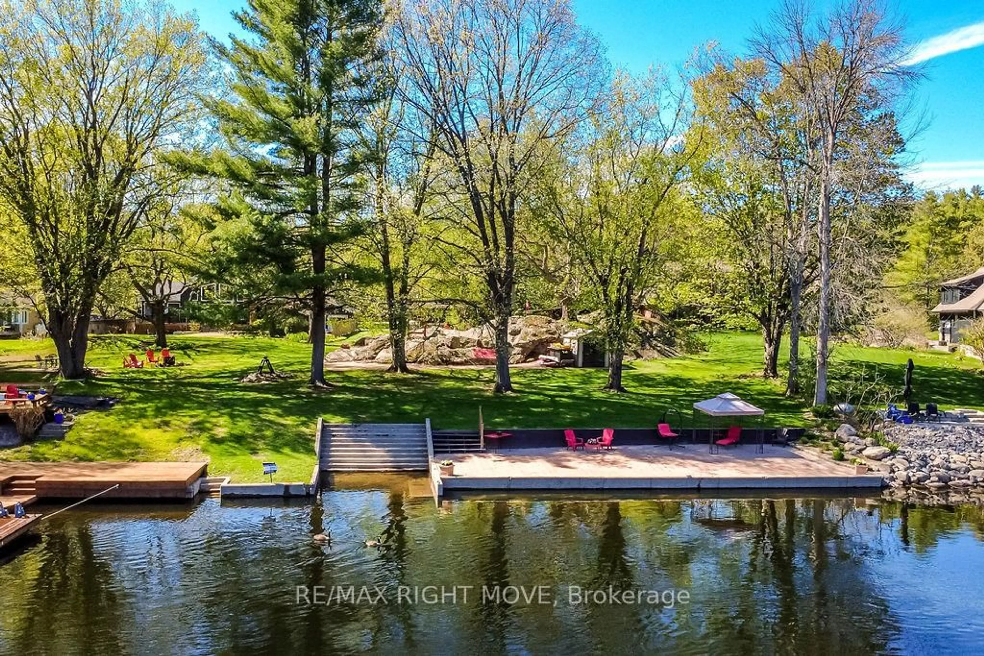 A pic from outside/outdoor area/front of a property/back of a property/a pic from drone, water/lake/river/ocean view for 1032 Cowbell Lane, Gravenhurst Ontario P0E 1N0