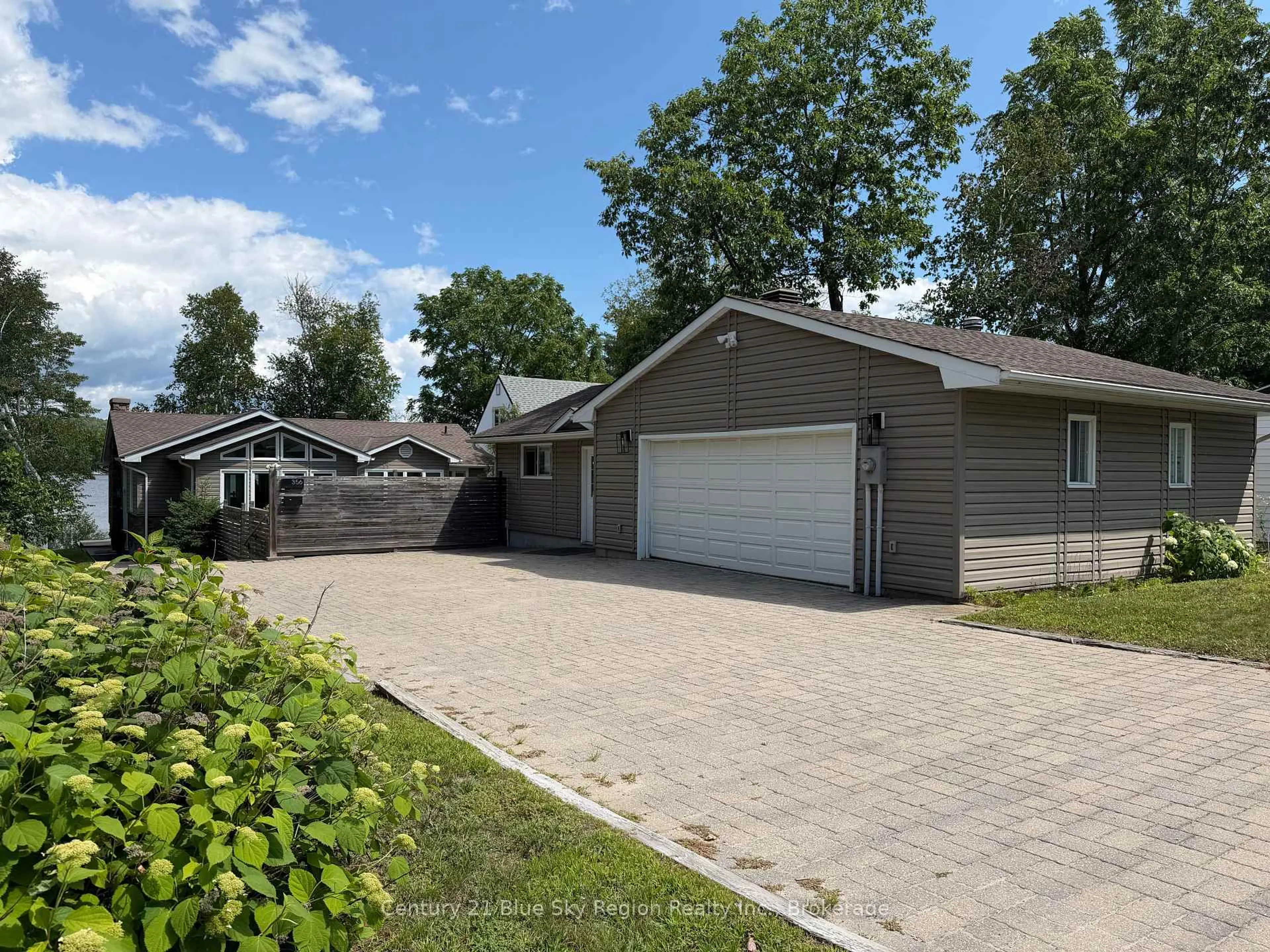 A pic from outside/outdoor area/front of a property/back of a property/a pic from drone, street for 356 LAKESIDE Dr, North Bay Ontario P1A 3E4
