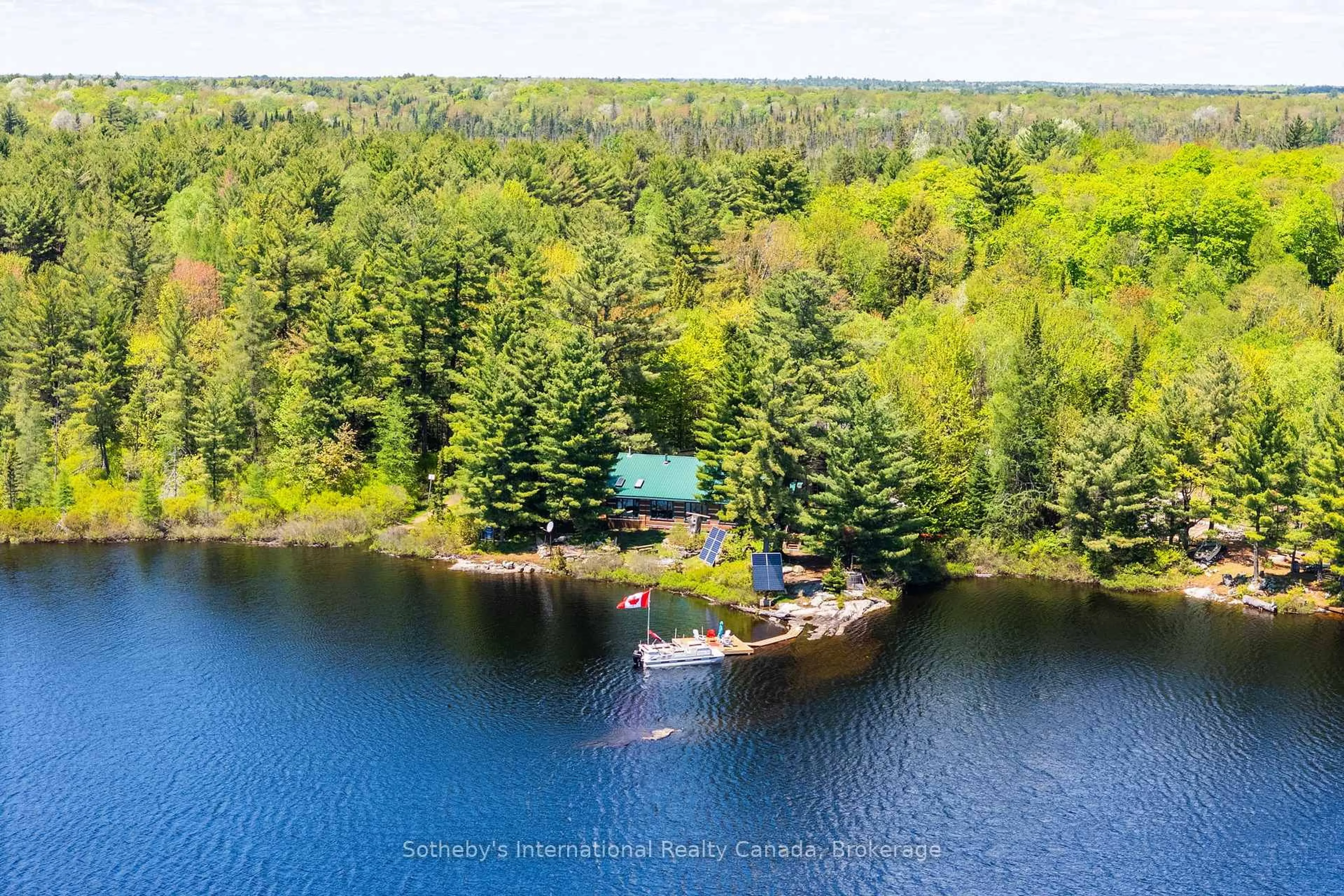 A pic from outside/outdoor area/front of a property/back of a property/a pic from drone, water/lake/river/ocean view for 3491A Axe Lake Rd, McMurrich/Monteith Ontario P0A 1Y0