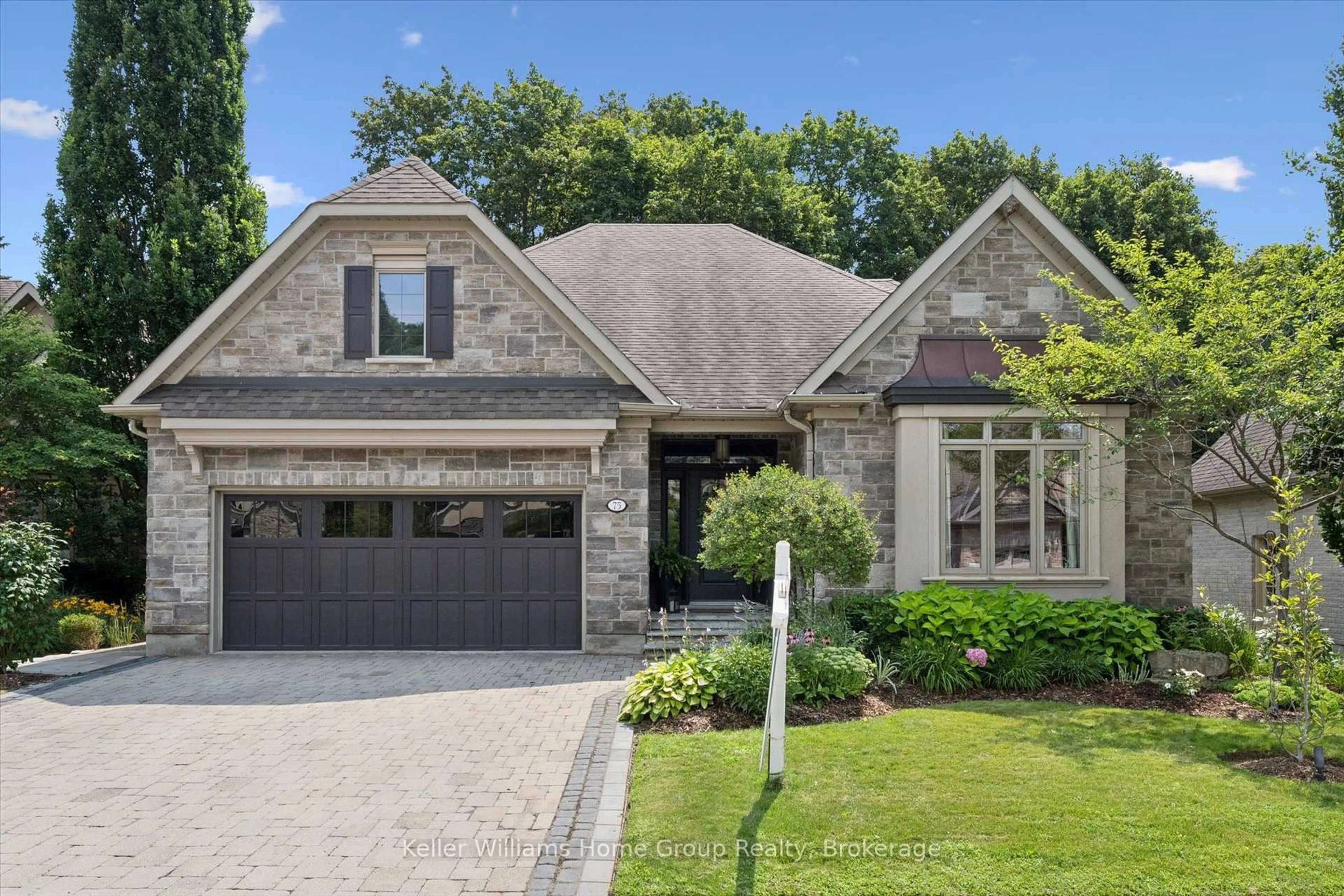 Home with brick exterior material, street for 75 Woodside Rd, Guelph Ontario N1G 2H1