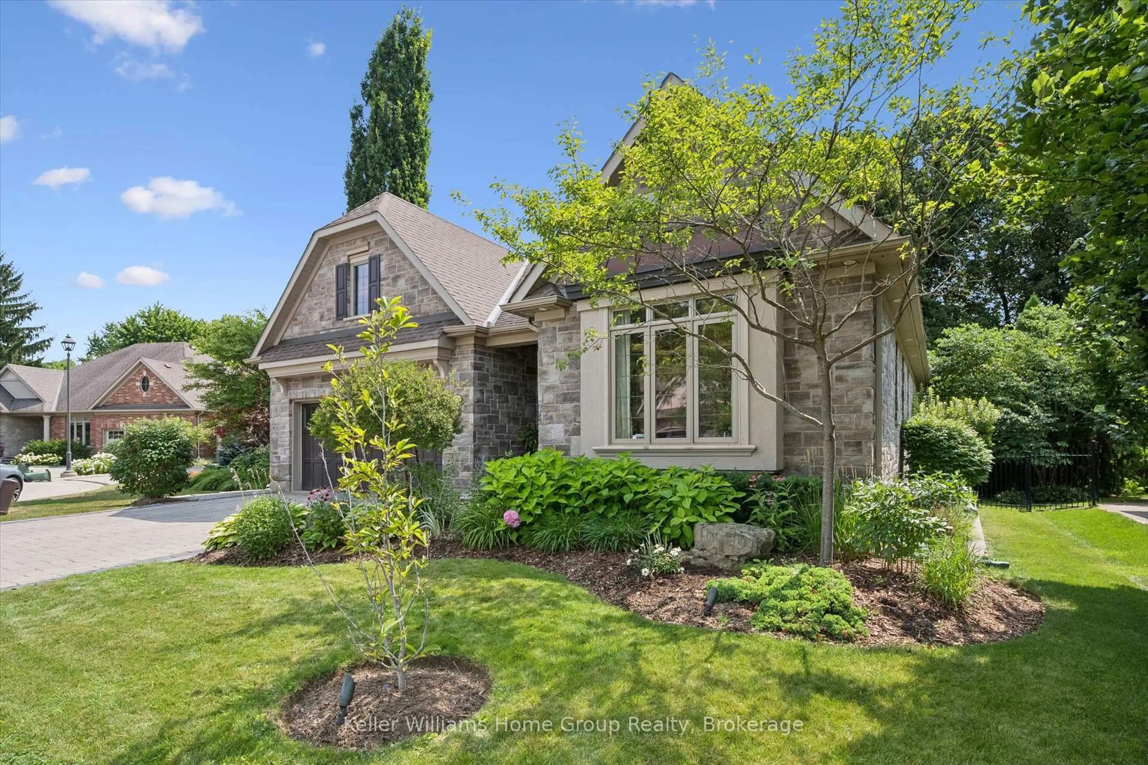 Home with brick exterior material, street for 75 Woodside Rd, Guelph Ontario N1G 2H1