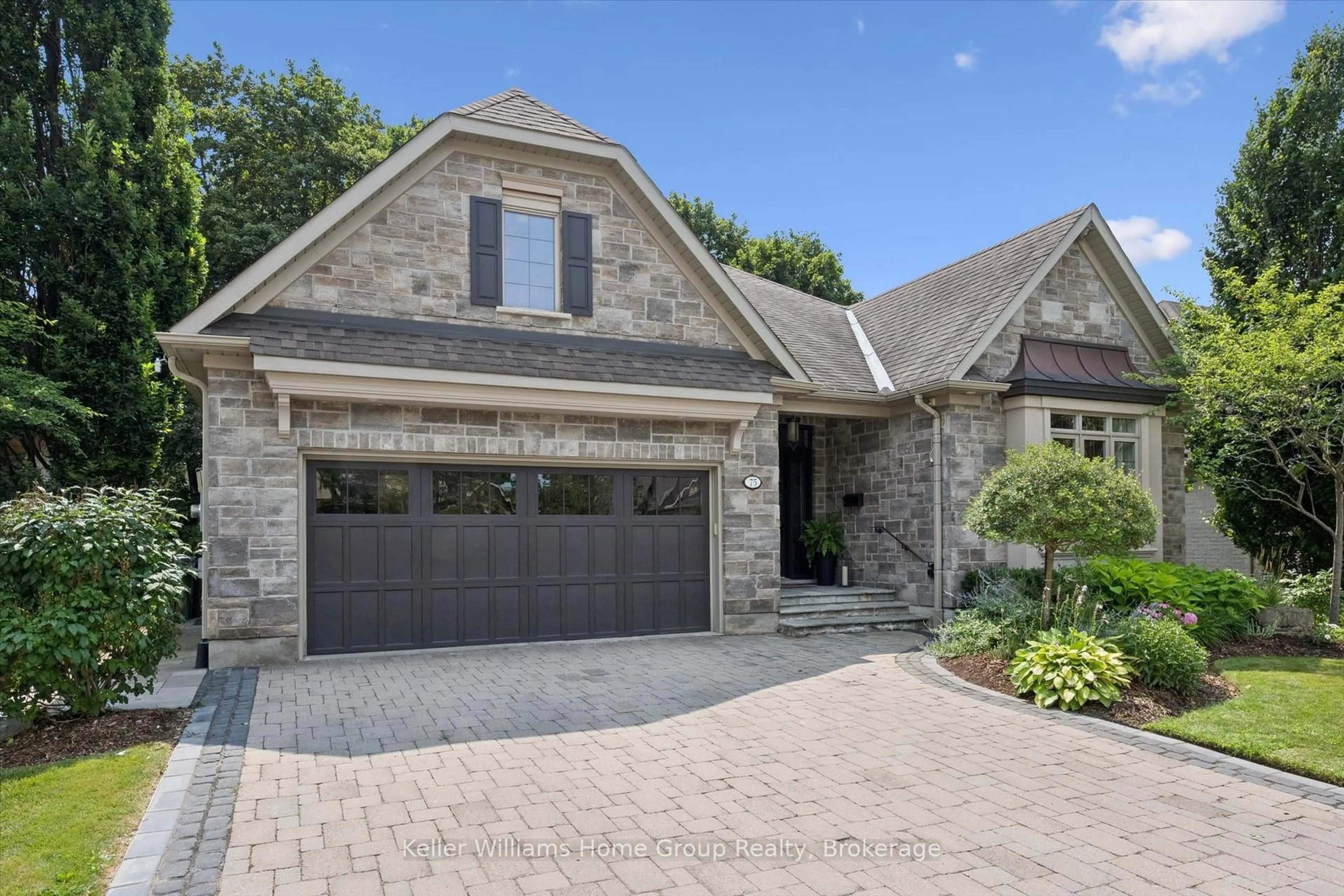 Home with brick exterior material, street for 75 Woodside Rd, Guelph Ontario N1G 2H1