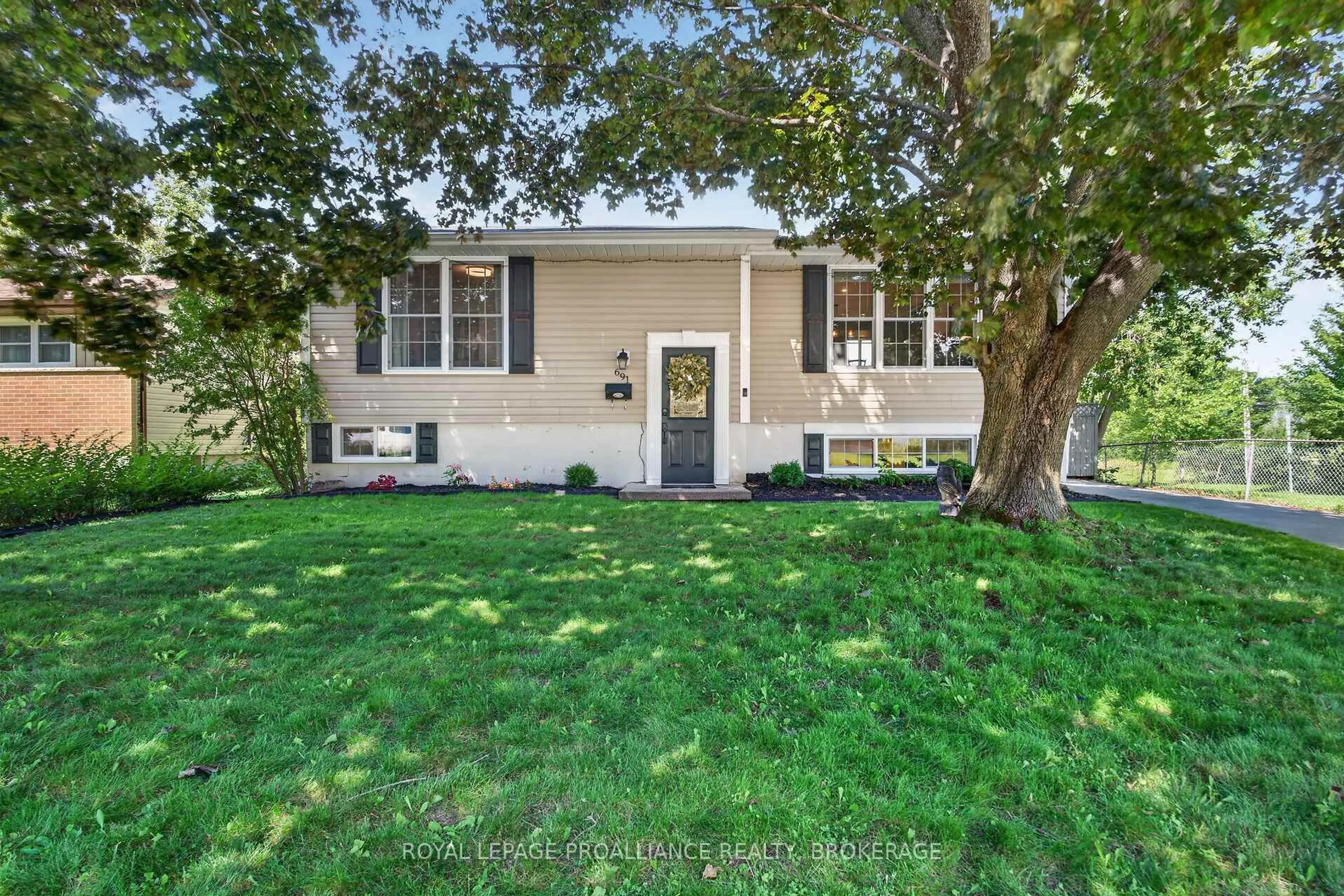 Home with vinyl exterior material, street for 691 Aylmer Cres, Kingston Ontario K7M 6L7