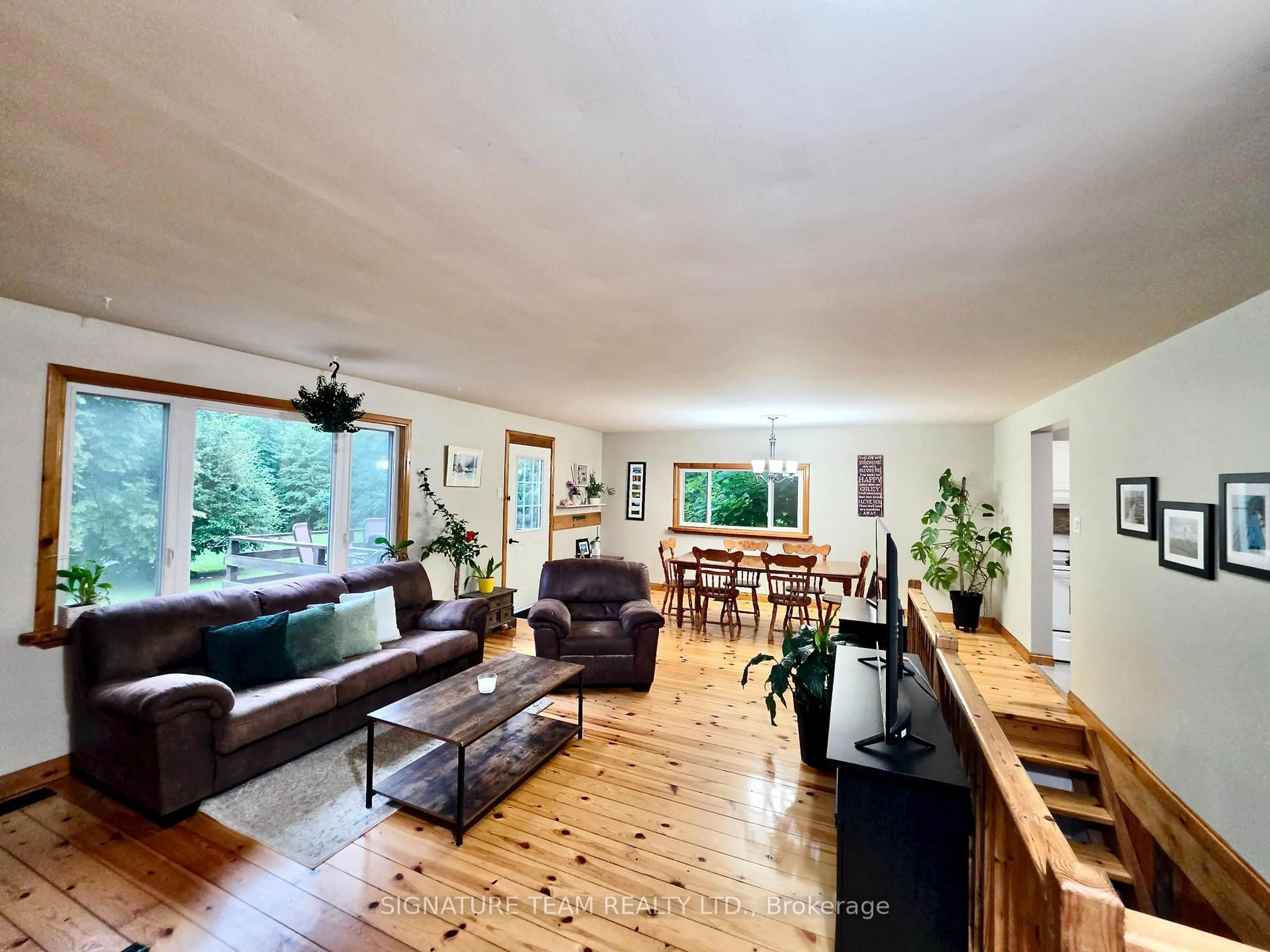 Living room with furniture, wood/laminate floor for 57 Gleason Lane, Deep River Ontario K0J 1P0