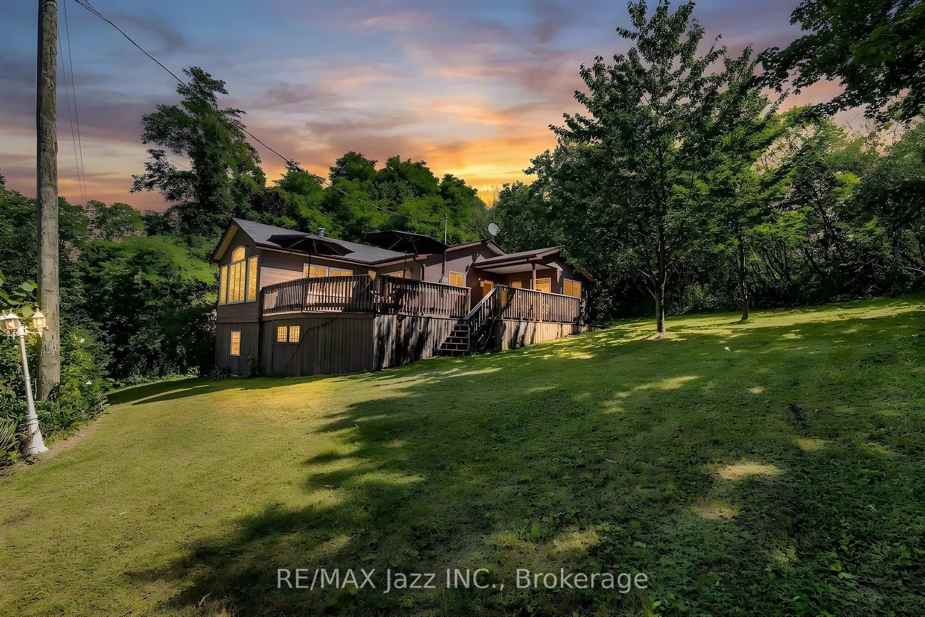 A pic from outside/outdoor area/front of a property/back of a property/a pic from drone, water/lake/river/ocean view for 50 Long Island, Otonabee-South Monaghan Ontario K0L 1B0
