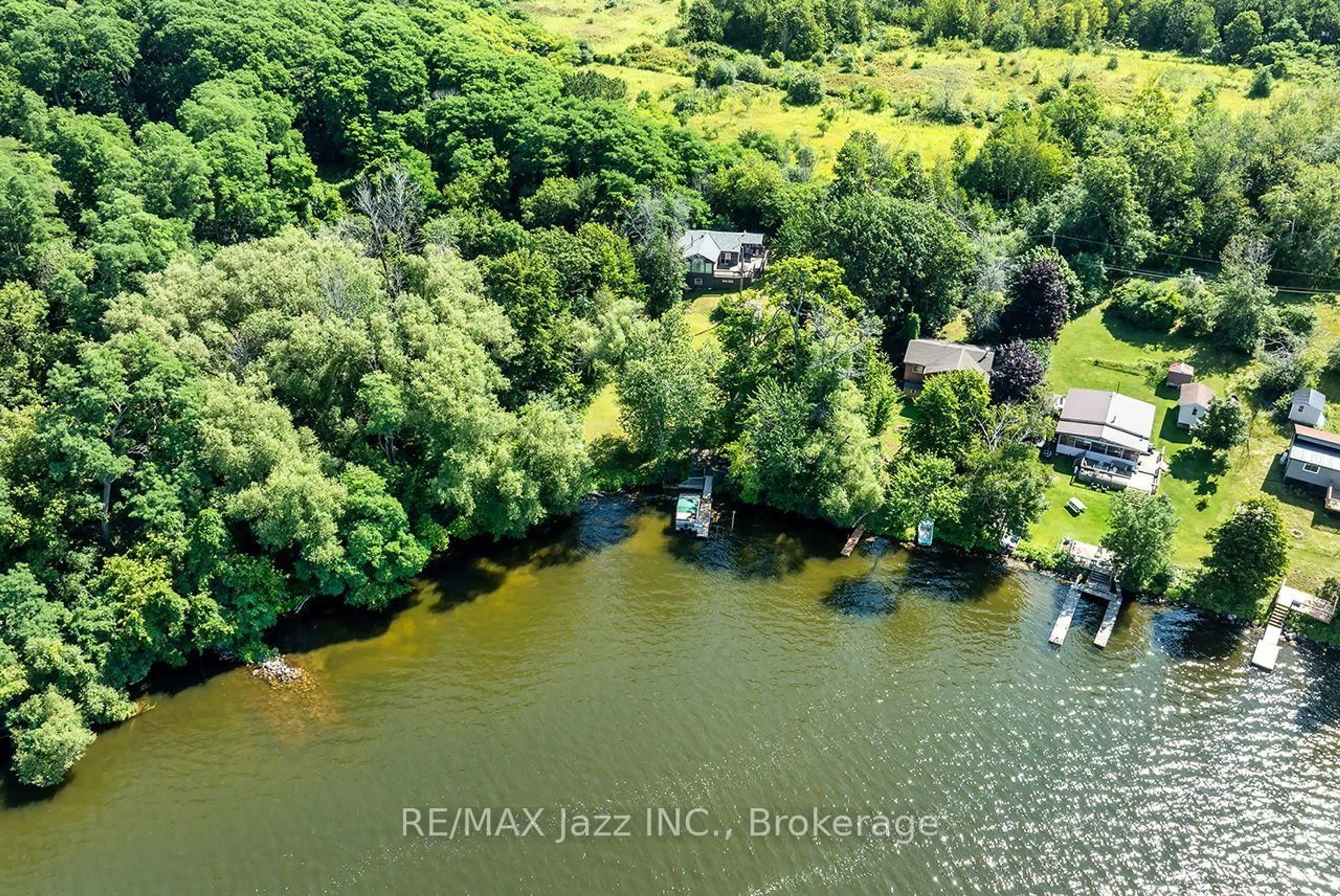 A pic from outside/outdoor area/front of a property/back of a property/a pic from drone, water/lake/river/ocean view for 50 Long Island, Otonabee-South Monaghan Ontario K0L 1B0