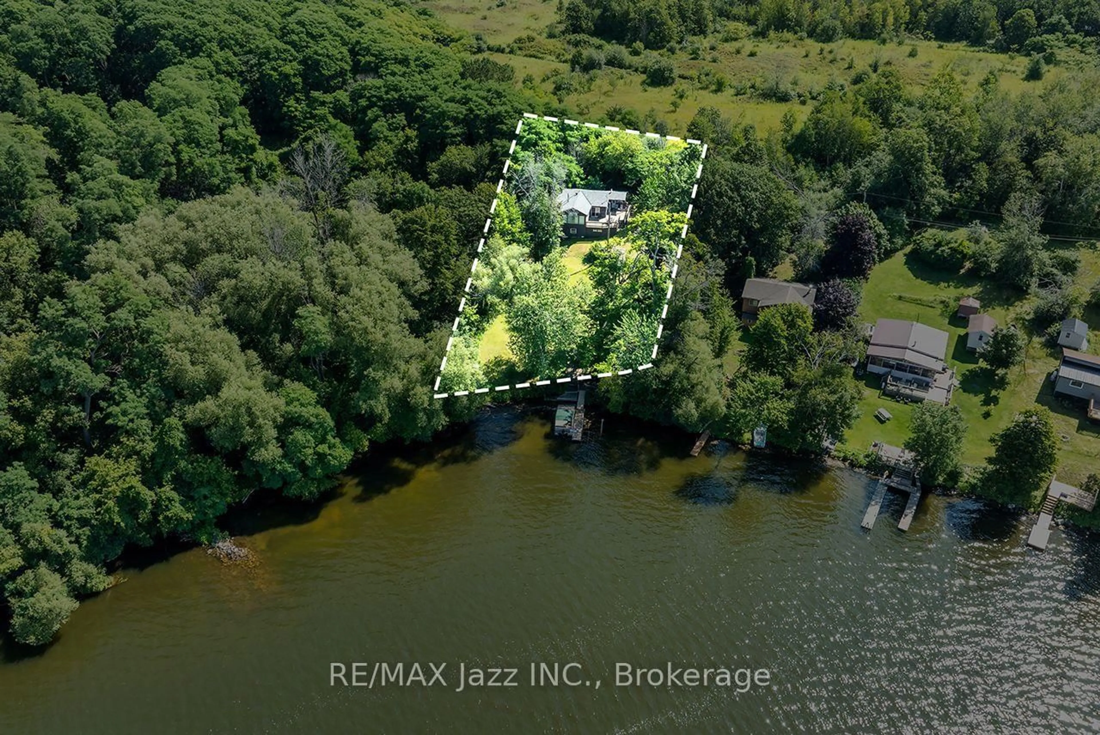 A pic from outside/outdoor area/front of a property/back of a property/a pic from drone, water/lake/river/ocean view for 50 Long Island, Otonabee-South Monaghan Ontario K0L 1B0