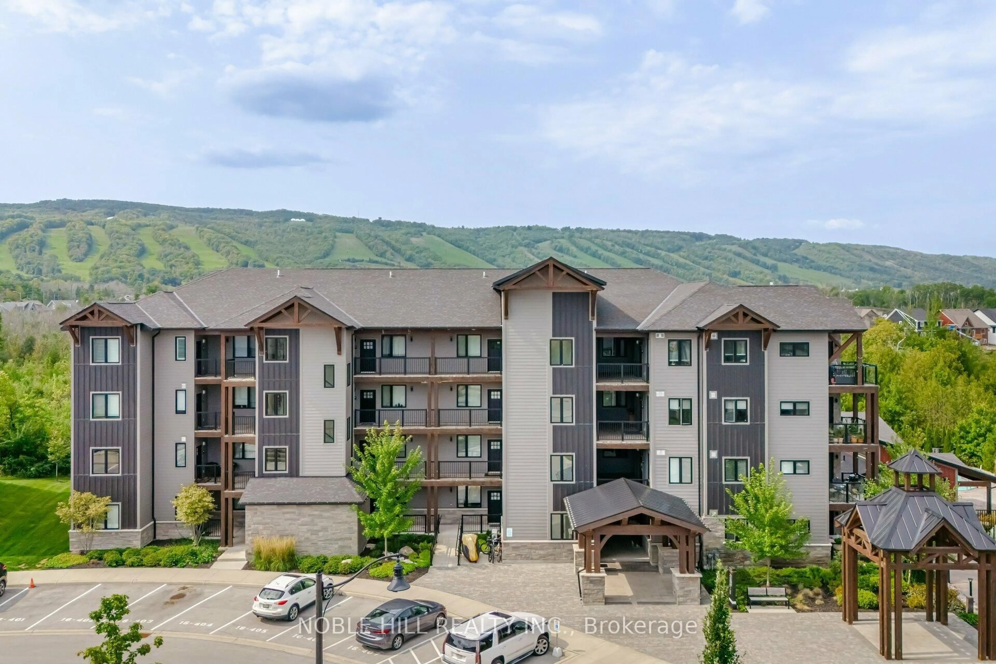 A pic from outside/outdoor area/front of a property/back of a property/a pic from drone, mountain view for 16 Beckwith Lane #403, Blue Mountains Ontario L9Y 3B6