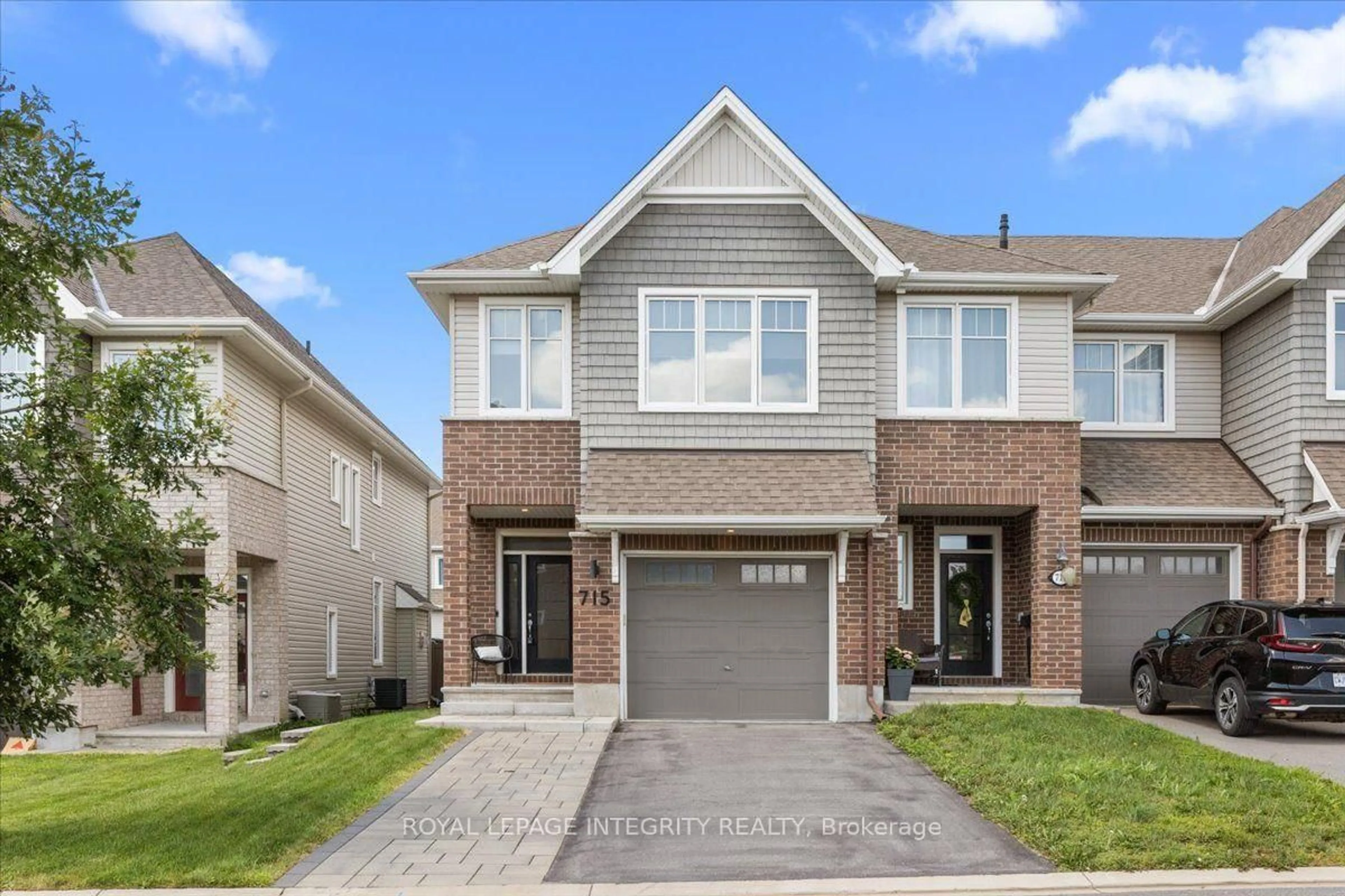 Home with brick exterior material, street for 715 Cap Diamant Way, Ottawa Ontario K4A 1J6