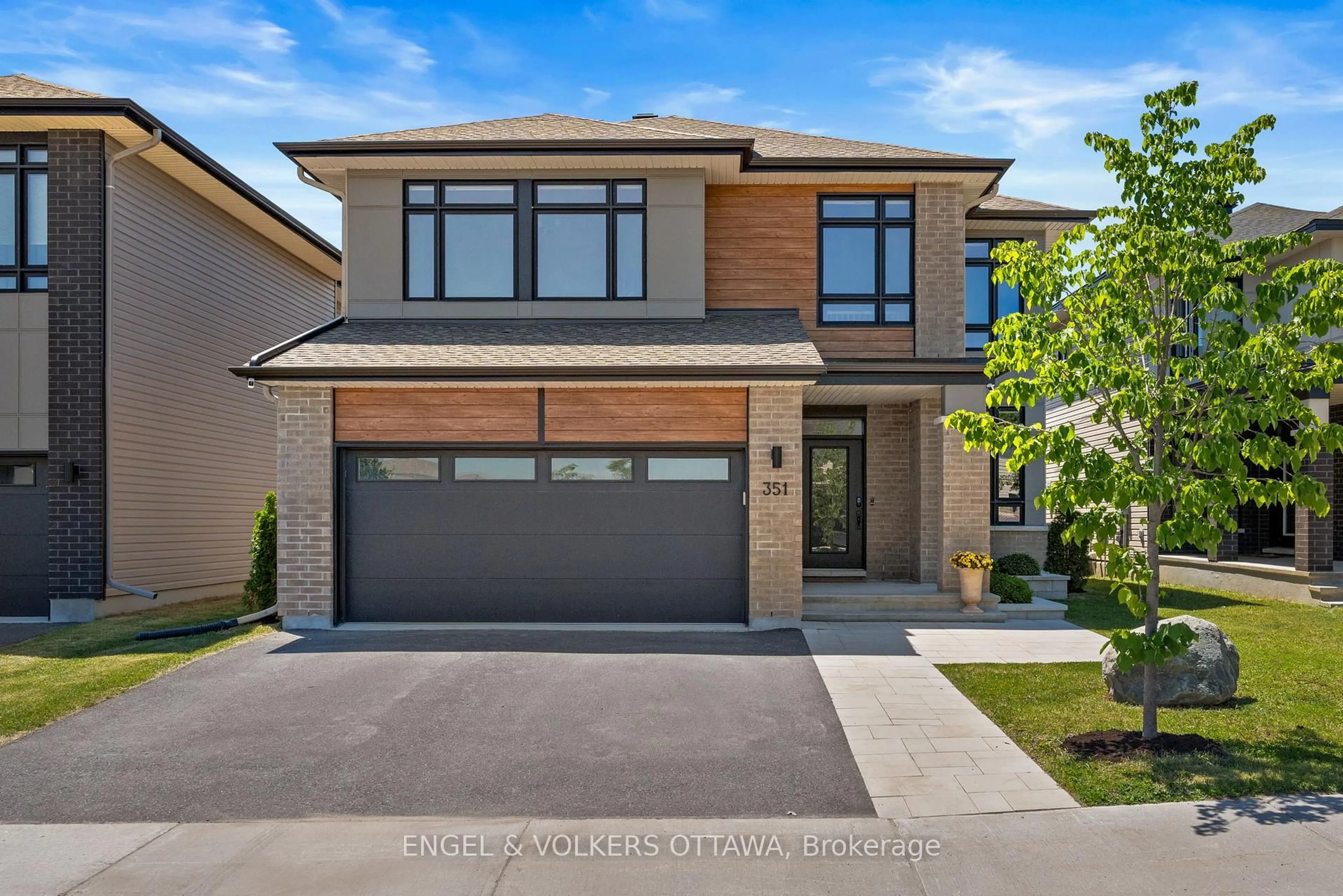 Home with brick exterior material, street for 351 Shuttleworth Dr, Ottawa Ontario K1T 0T6