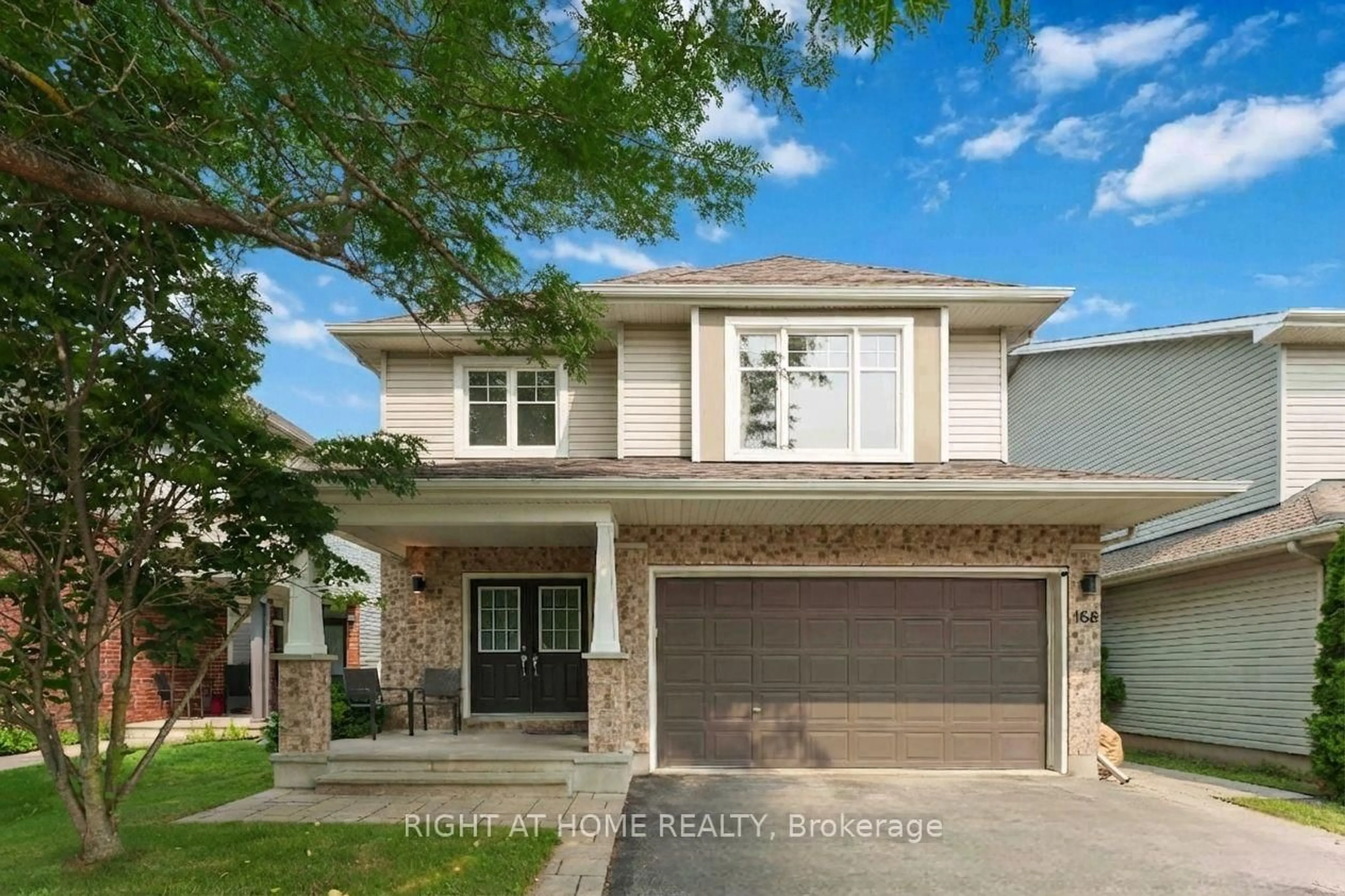 Home with brick exterior material, street for 168 Steeple Chase Dr, Ottawa Ontario K2M 2Z4