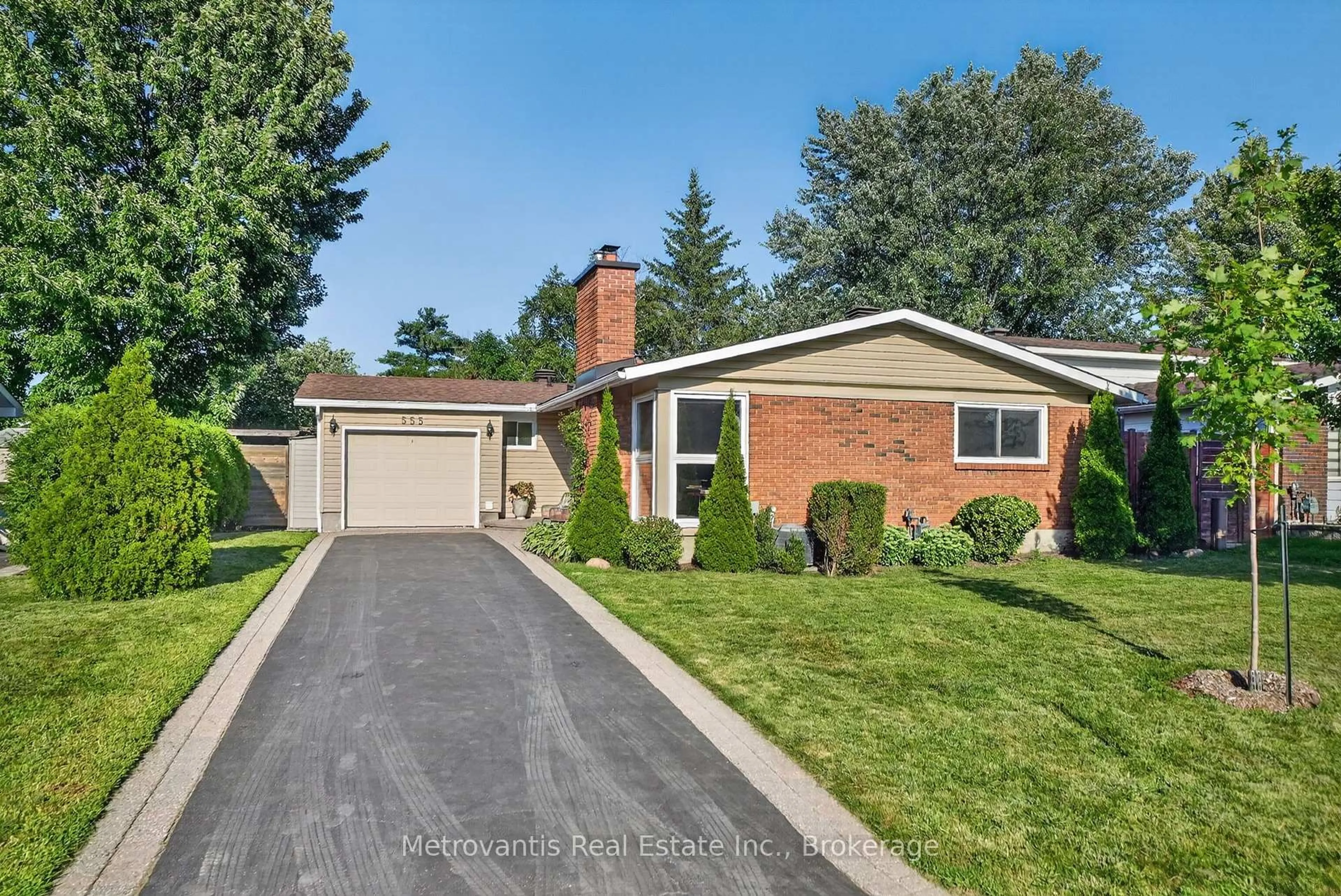 Home with brick exterior material, street for 555 Buchanan Cres, Ottawa Ontario K1J 7V2