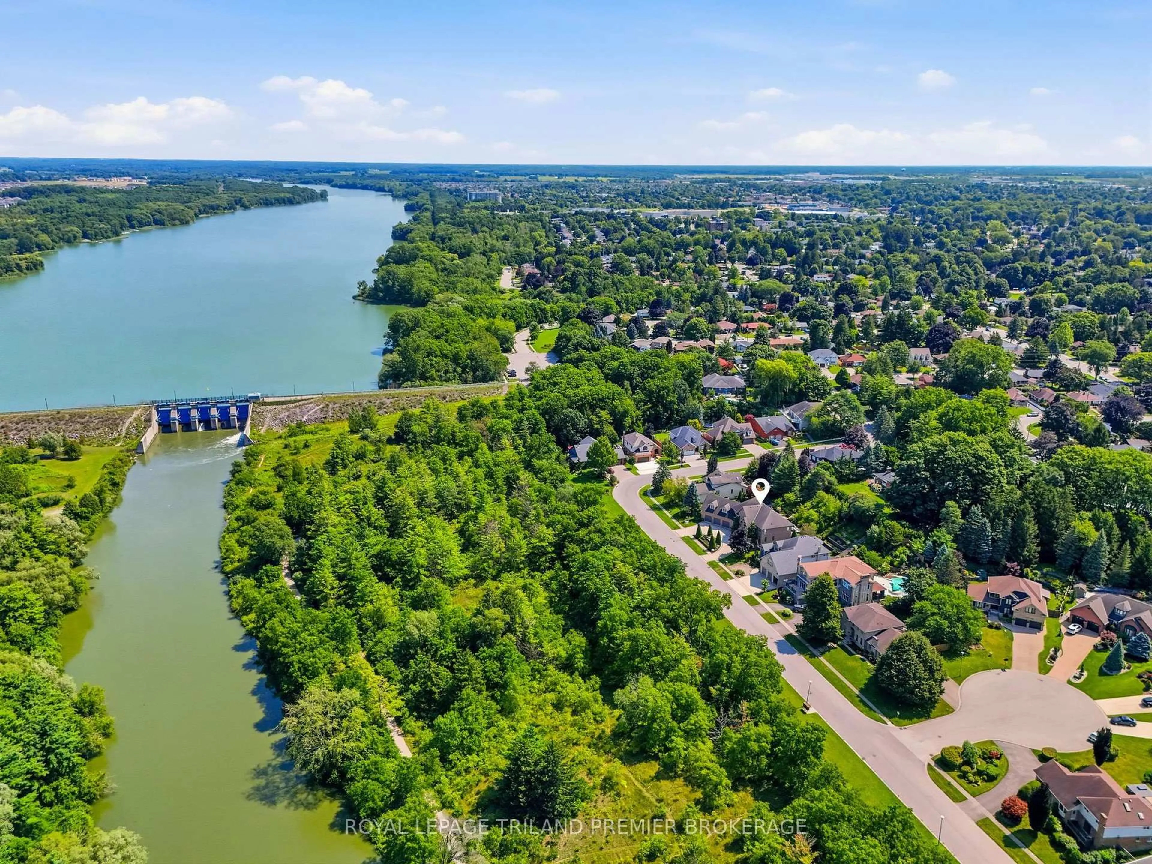 A pic from outside/outdoor area/front of a property/back of a property/a pic from drone, water/lake/river/ocean view for 23 Jack Poole Dr, Woodstock Ontario N4S 8V9