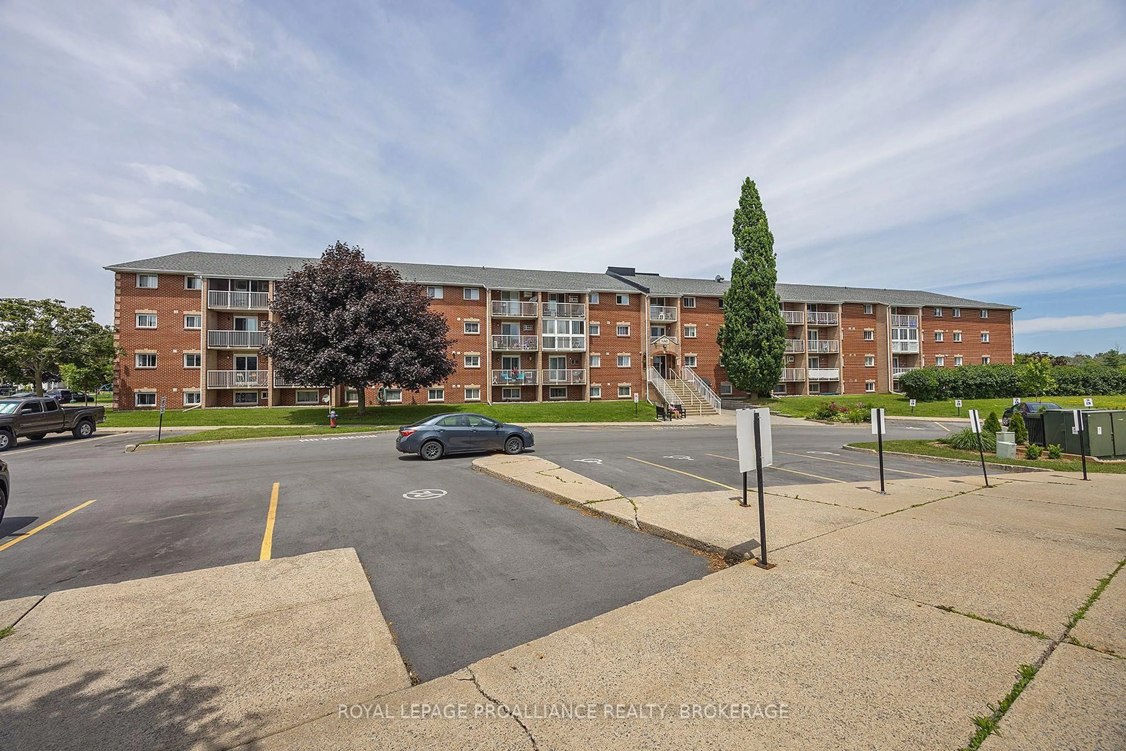 A pic from outside/outdoor area/front of a property/back of a property/a pic from drone, street for 580 Armstrong Rd #201, Kingston Ontario K7M 8M3