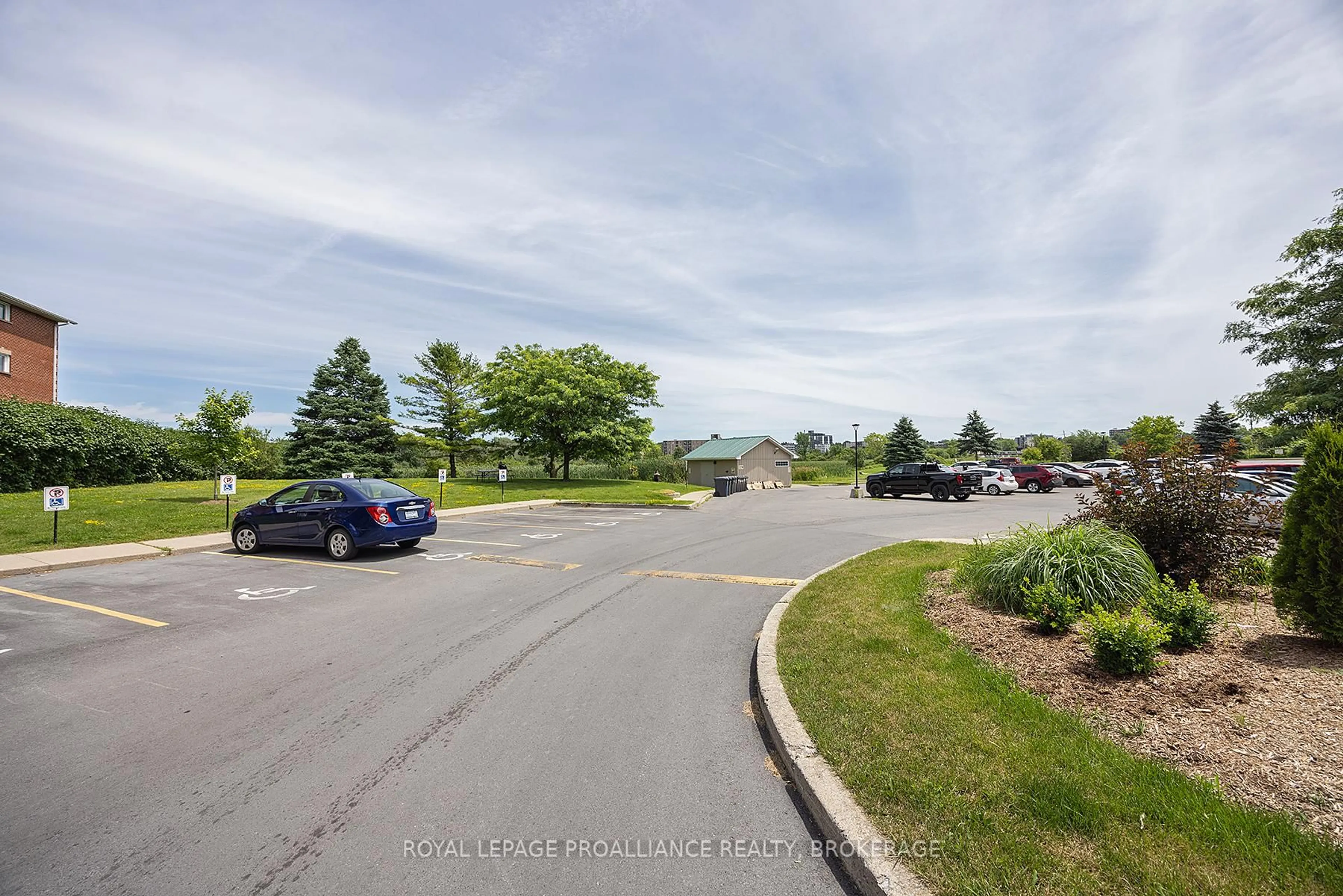 A pic from outside/outdoor area/front of a property/back of a property/a pic from drone, unknown for 580 Armstrong Rd #201, Kingston Ontario K7M 8M3