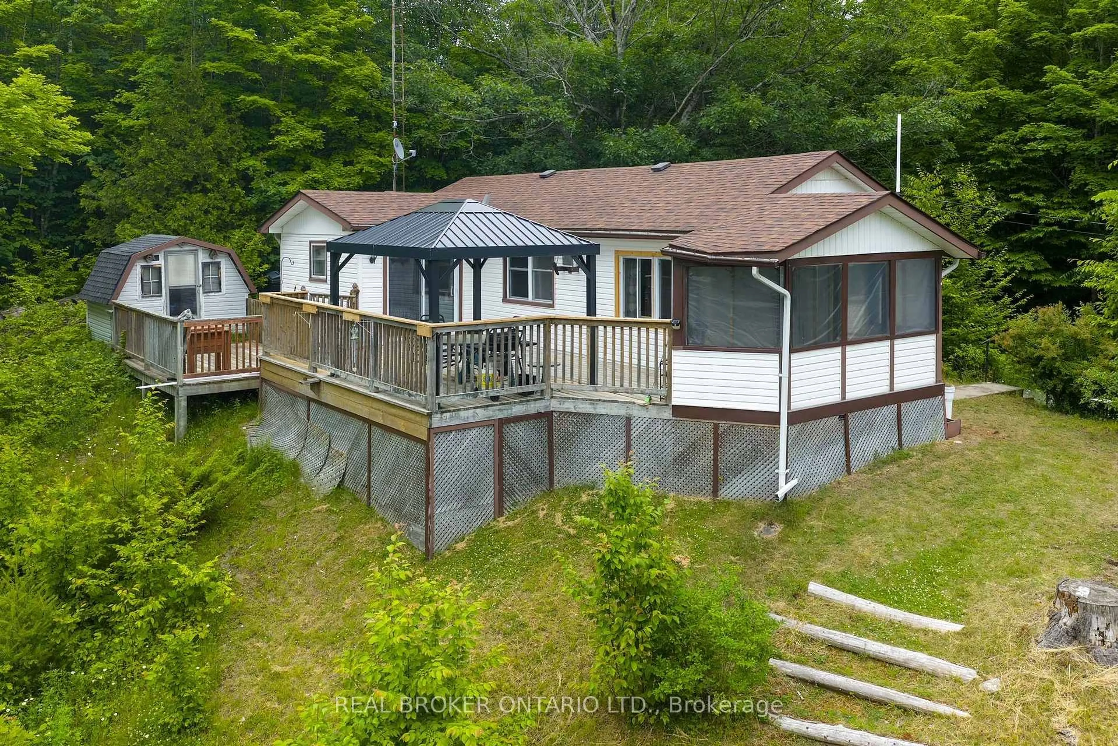 A pic from outside/outdoor area/front of a property/back of a property/a pic from drone, water/lake/river/ocean view for 1180 Guigue Rd, Sharbot Lake Ontario K0H 2P0
