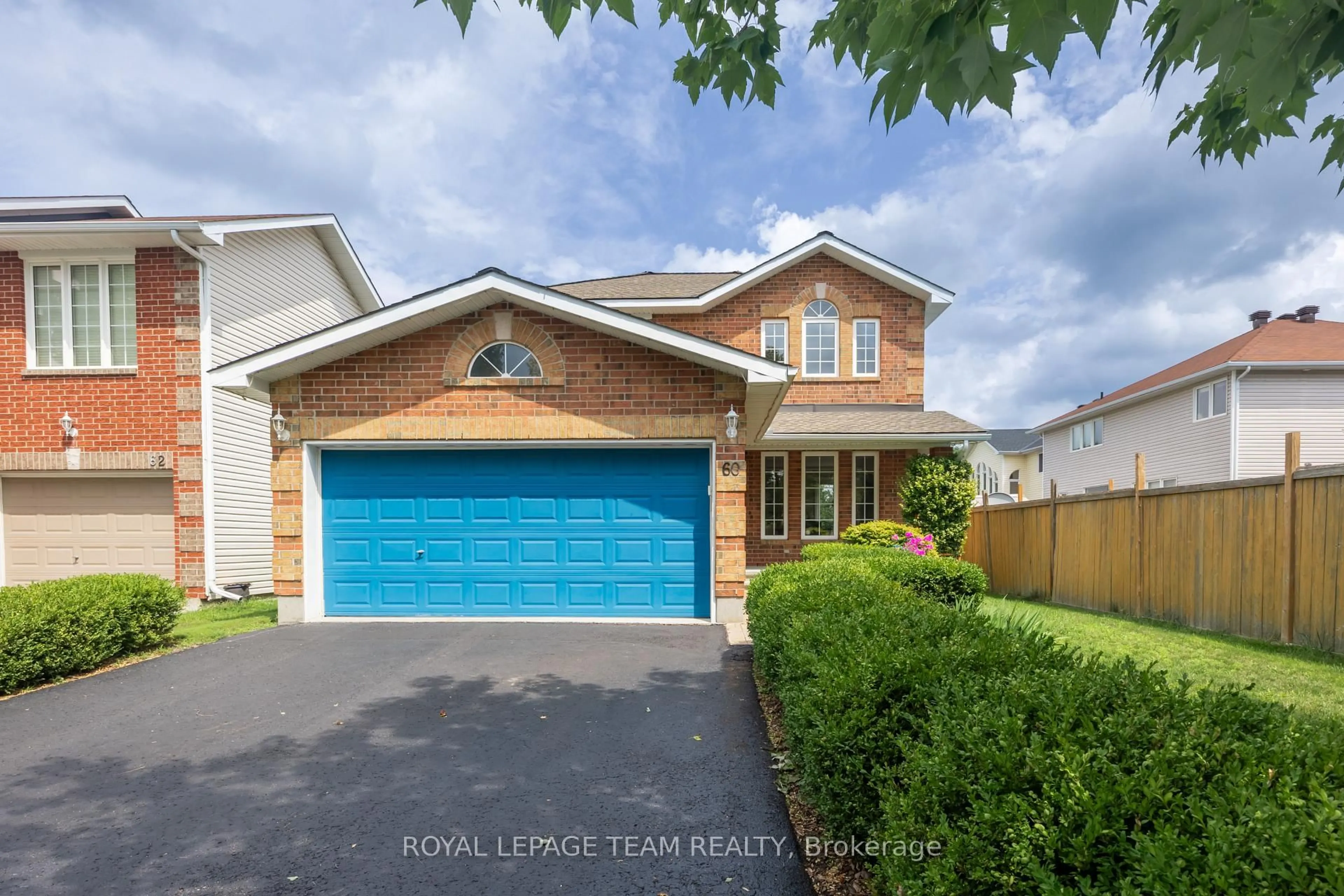 Home with vinyl exterior material, street for 60 Woliston Cres, Ottawa Ontario K2W 1E5