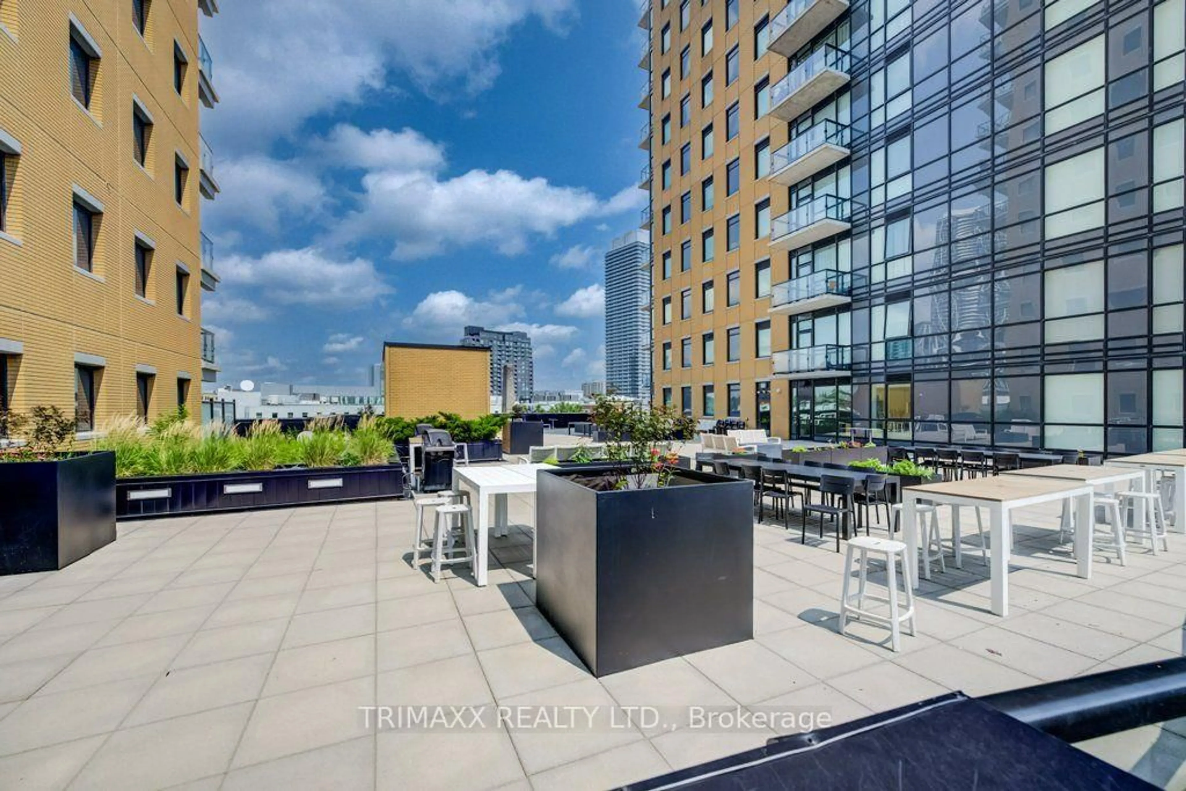 Patio, city buildings view from balcony for 100 Garment St, Kitchener Ontario N2G 0C3