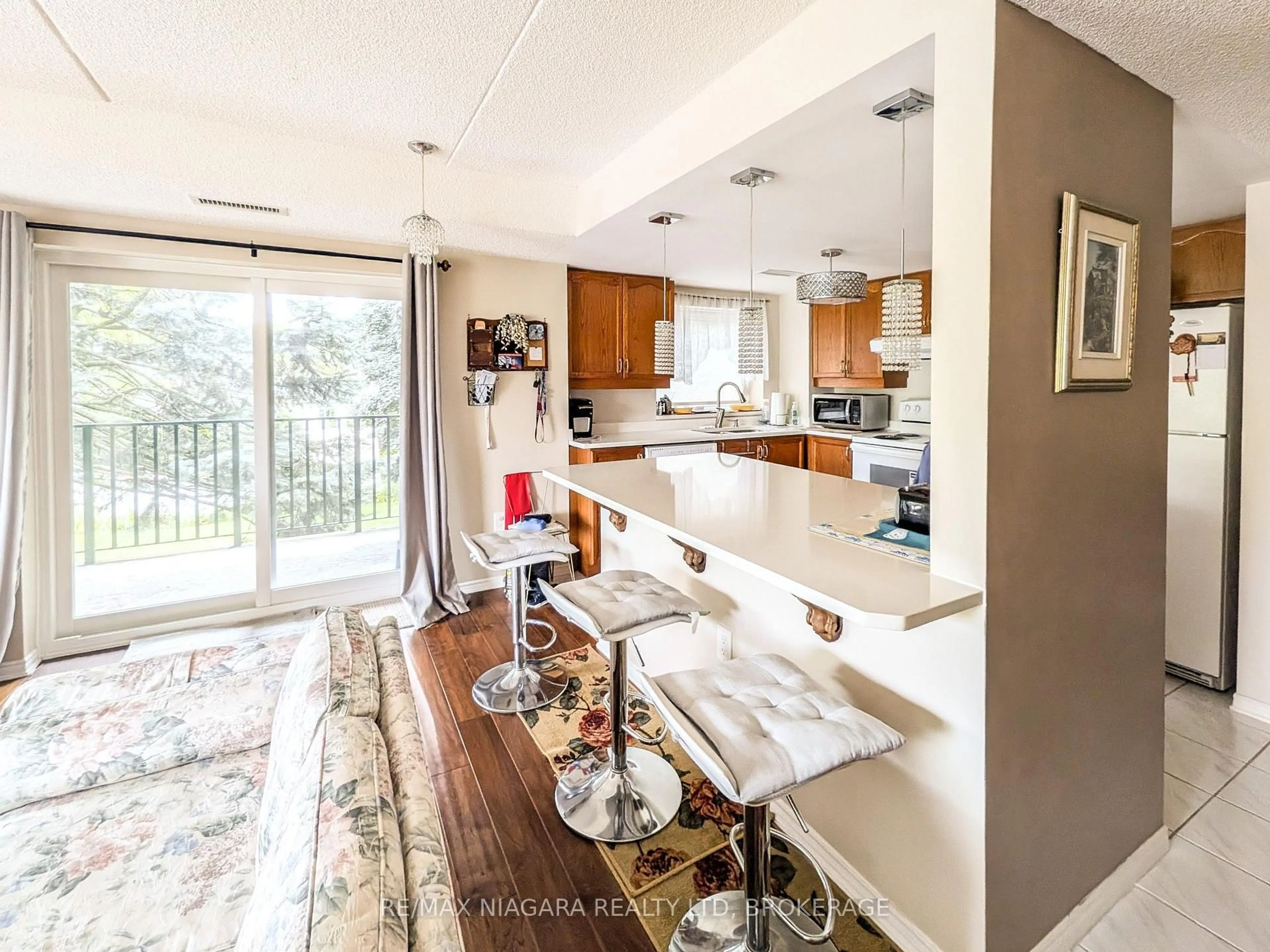 Open concept kitchen, unknown for 6704 Thorold Stone Rd #203, Niagara Falls Ontario L2J 1B3