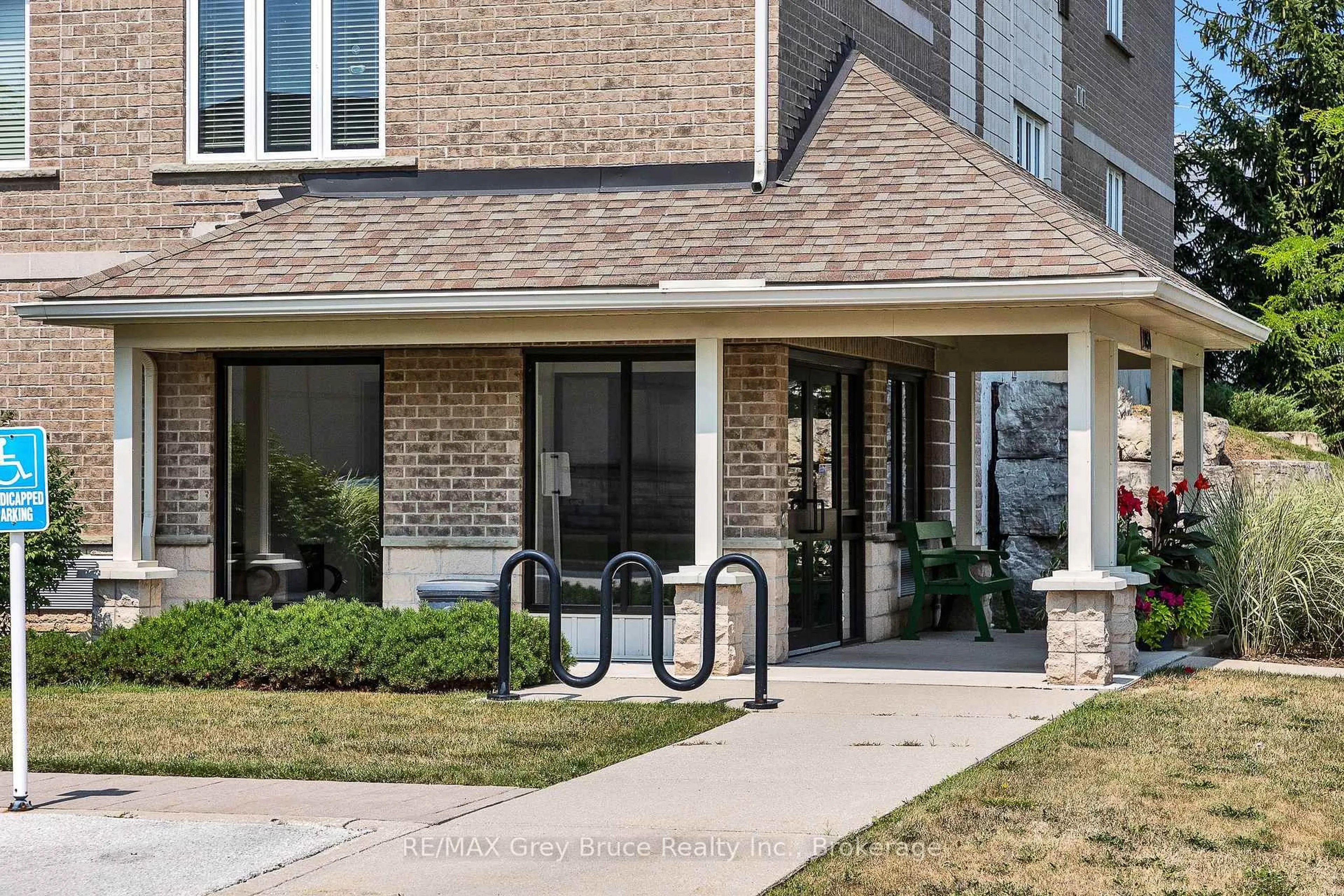 Home with brick exterior material, street for 1050 1st Ave #204, Owen Sound Ontario N4K 4K6