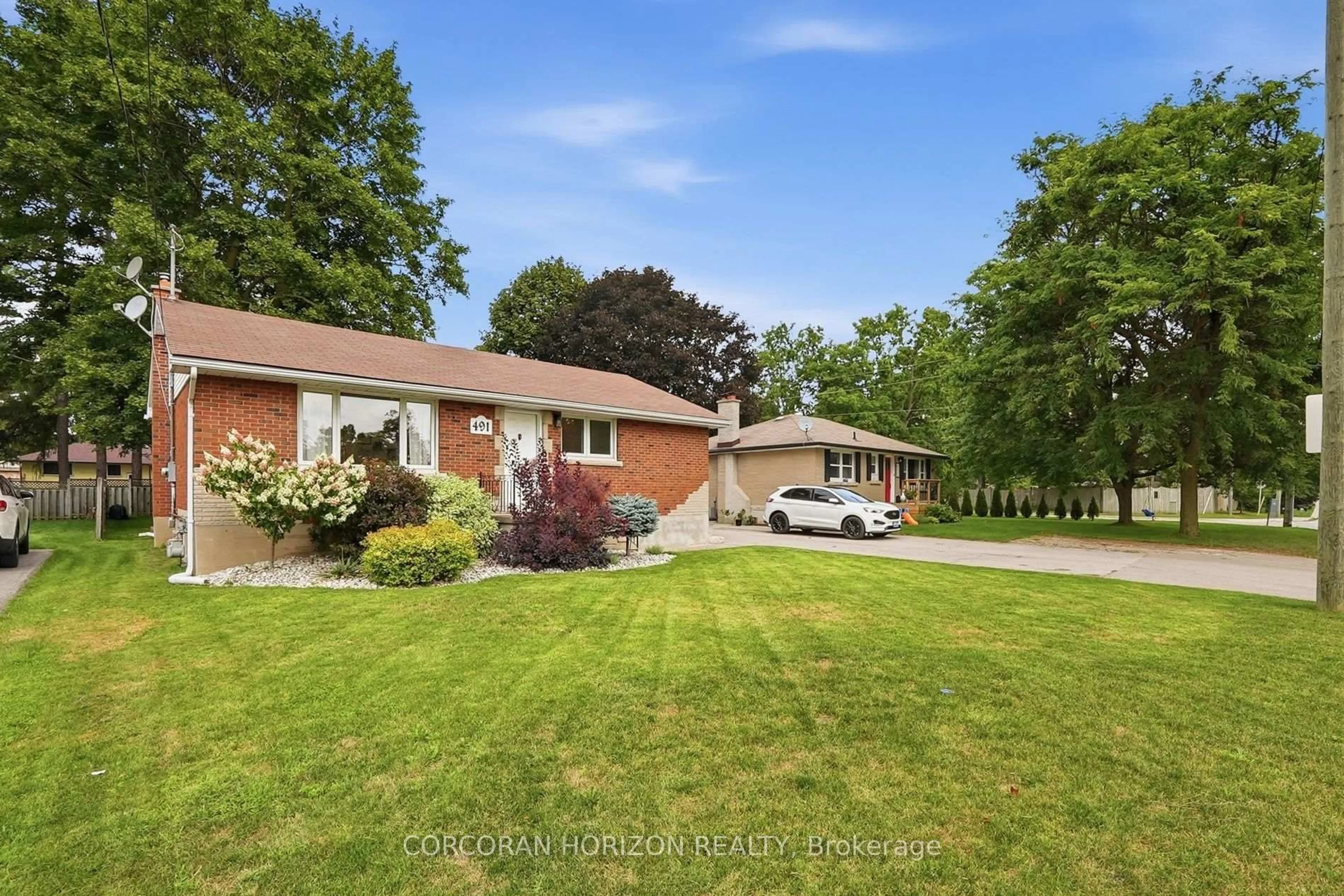 A pic from outside/outdoor area/front of a property/back of a property/a pic from drone, street for 491 St George St, Centre Wellington Ontario N1M 1K9