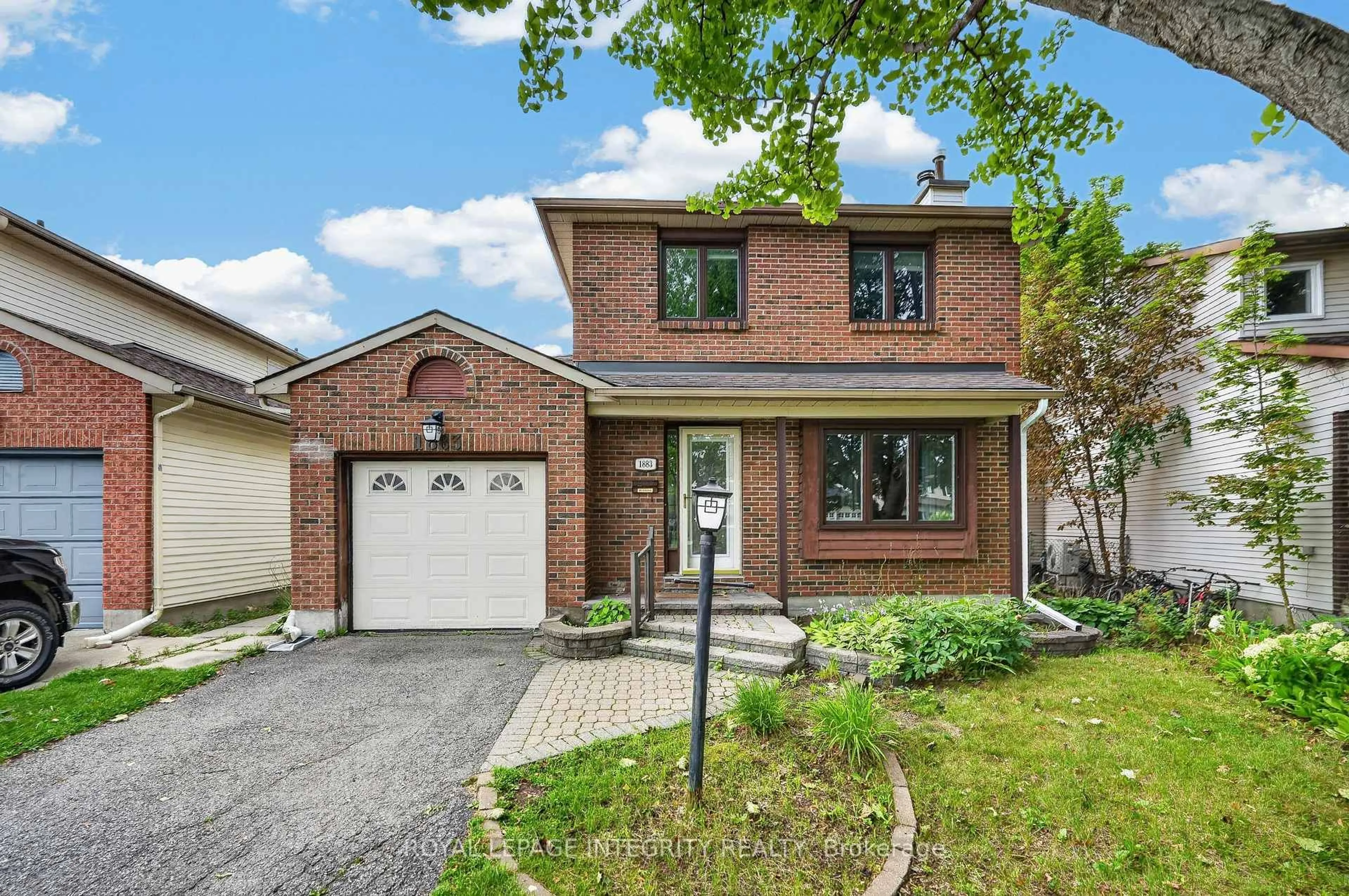 Home with brick exterior material, street for 1883 Des Prairies Ave, Ottawa Ontario K1E 2R5