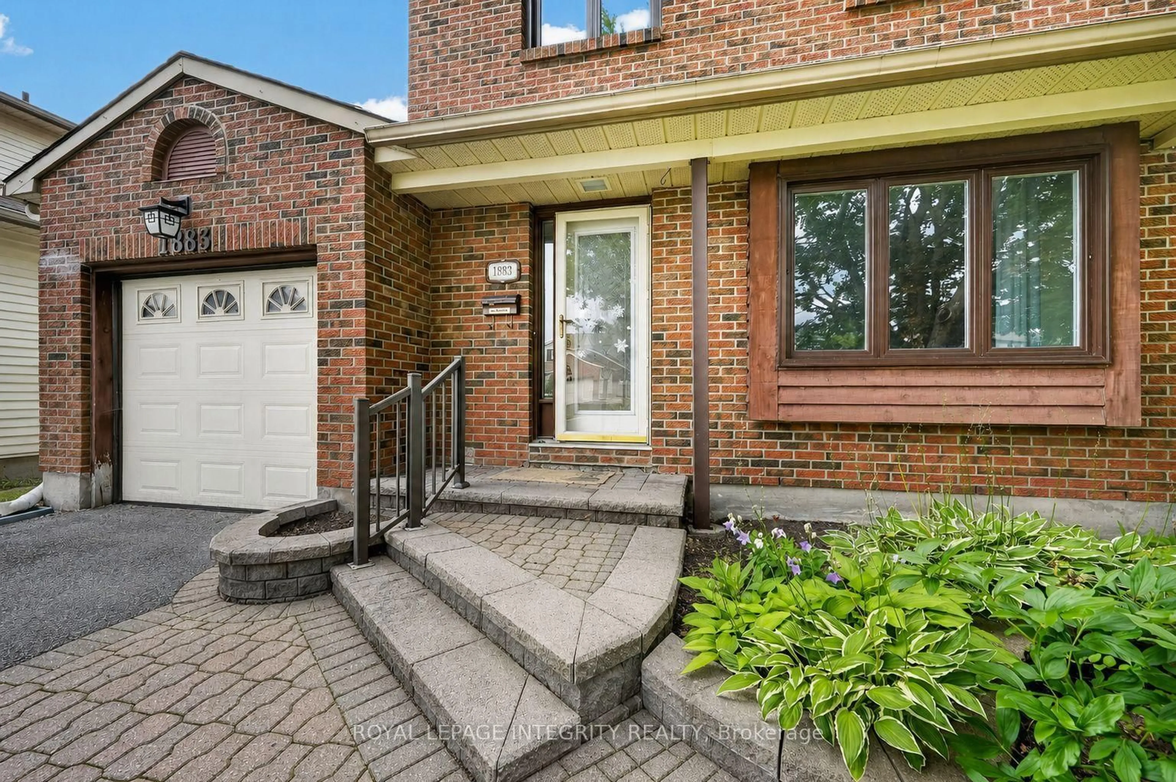 Home with brick exterior material, street for 1883 Des Prairies Ave, Ottawa Ontario K1E 2R5