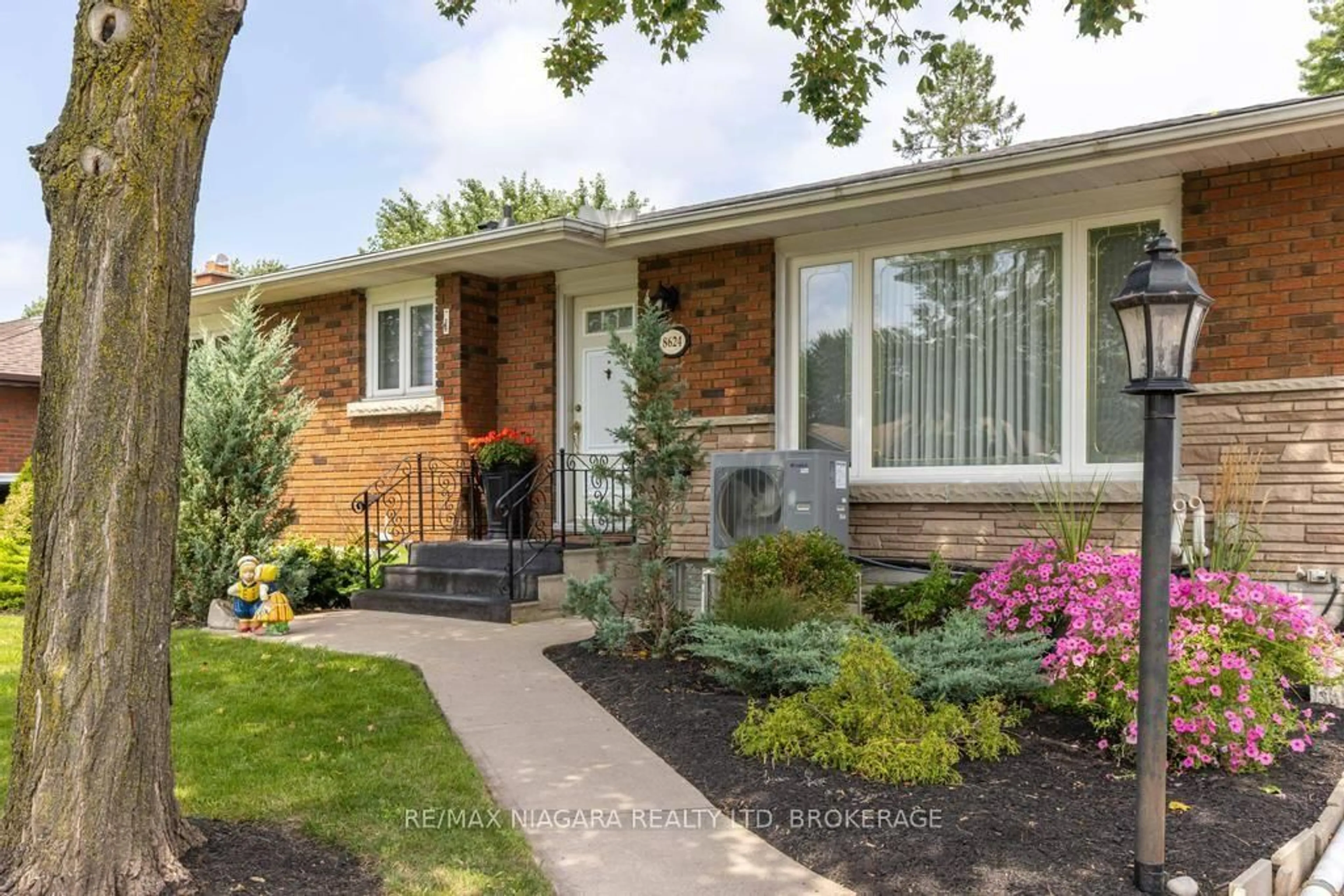 Home with brick exterior material, street for 8624 Champlain Dr, Niagara Falls Ontario L2G 6Y6