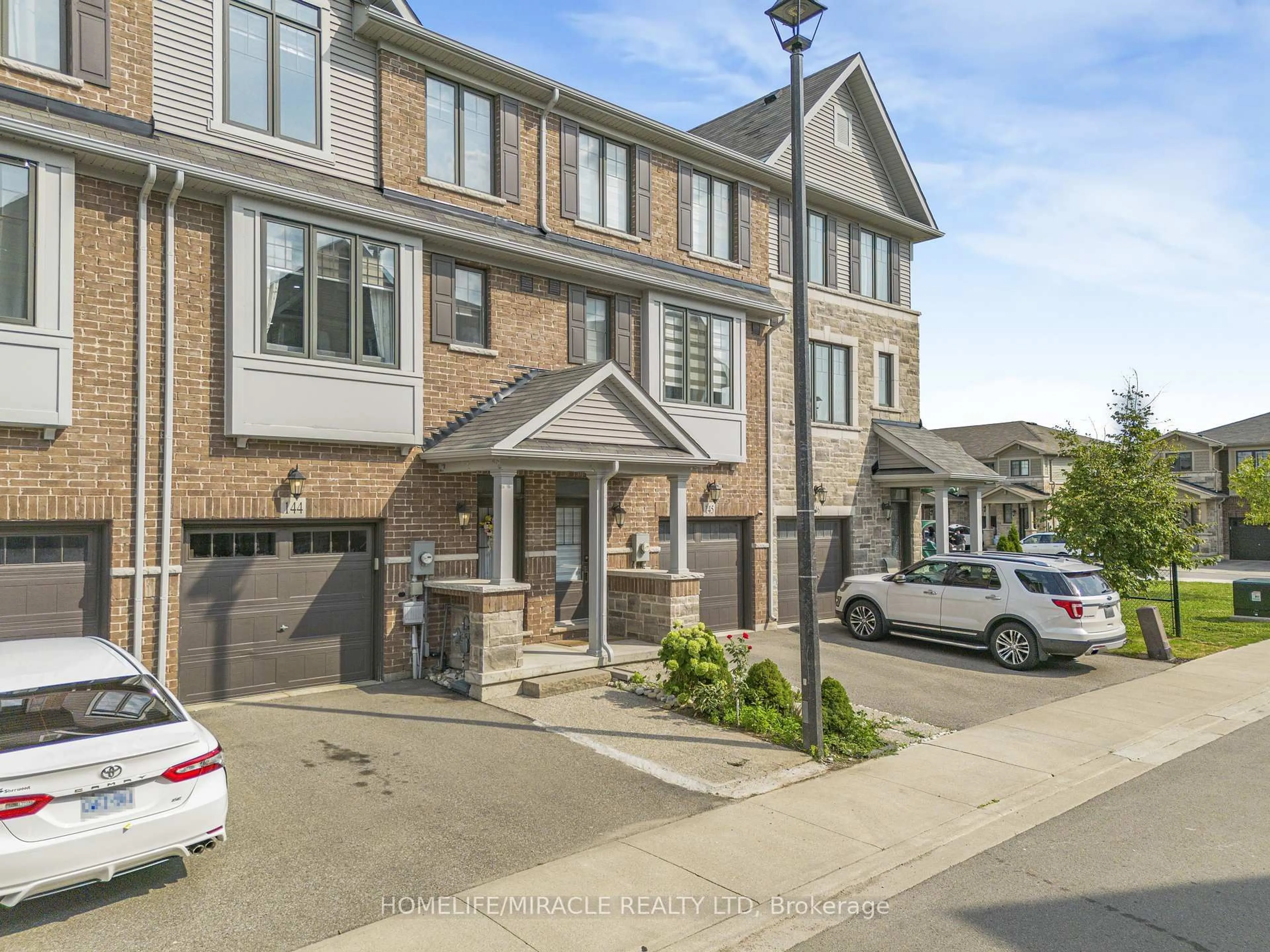 A pic from outside/outdoor area/front of a property/back of a property/a pic from drone, street for 1890 Rymal Rd #144, Hamilton Ontario L0R 1P0