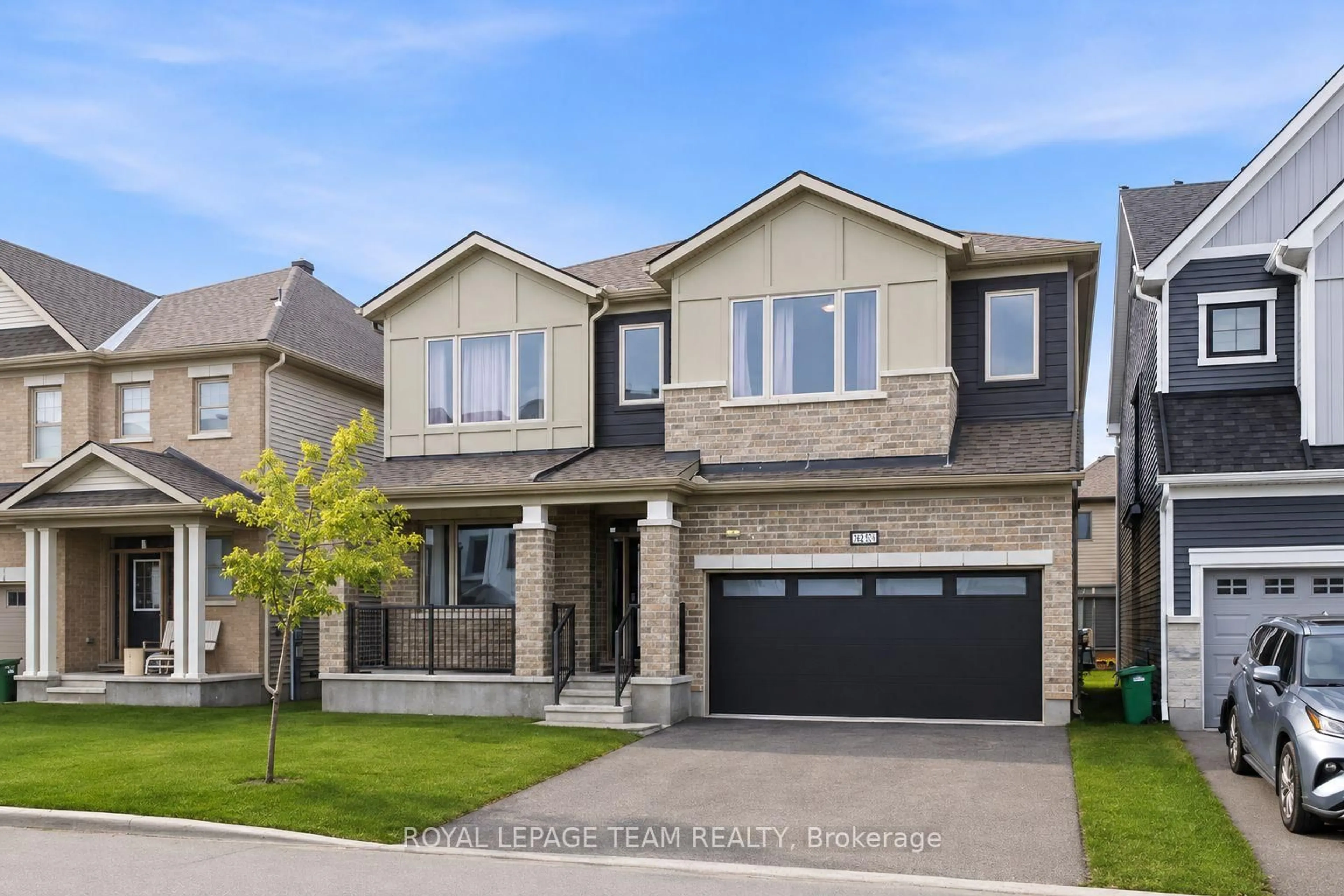 Home with brick exterior material, street for 2413 Watercolours Way, Ottawa Ontario K2J 7A9