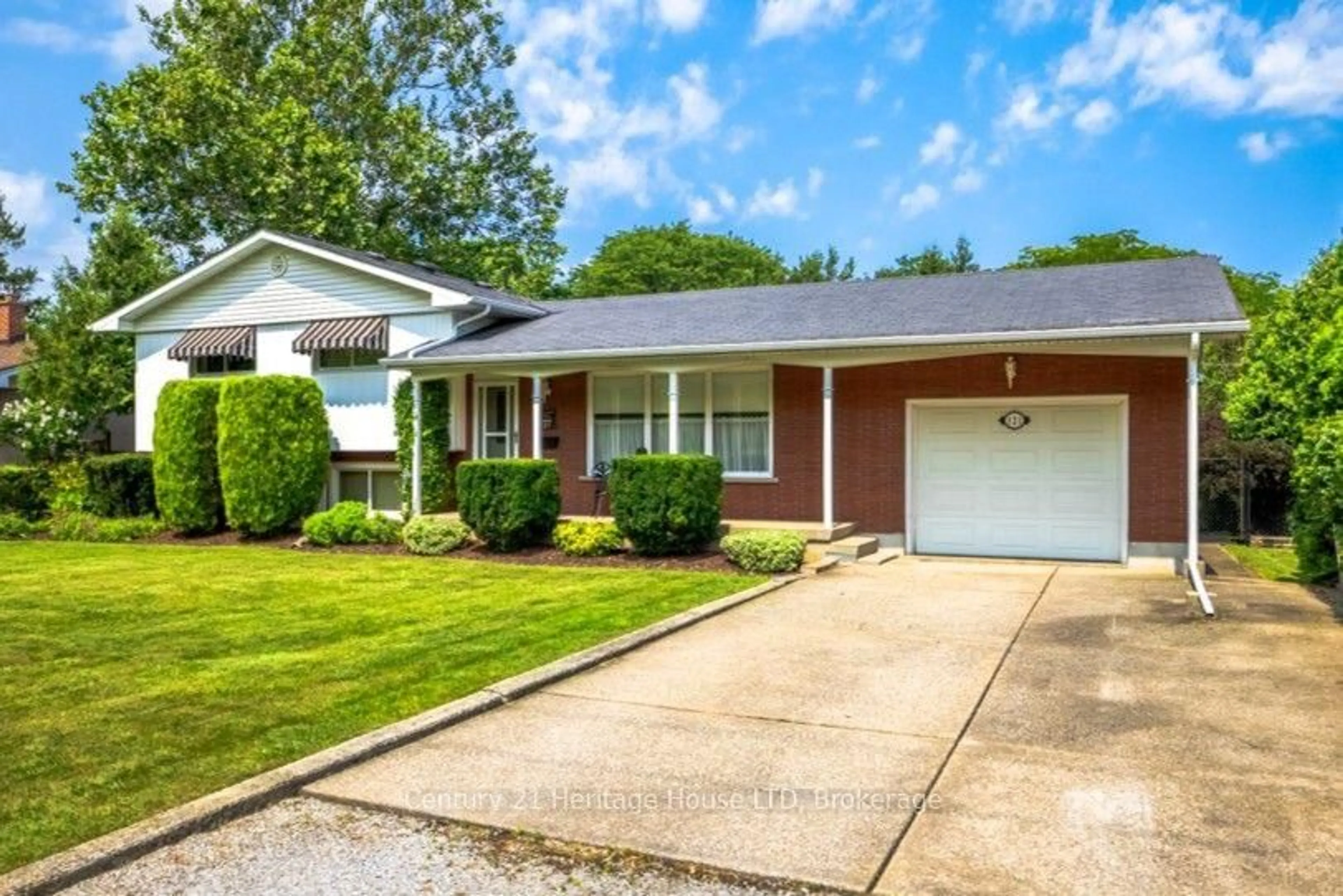 Home with brick exterior material, street for 121 Lockhart Dr, St. Catharines Ontario L2T 1W3