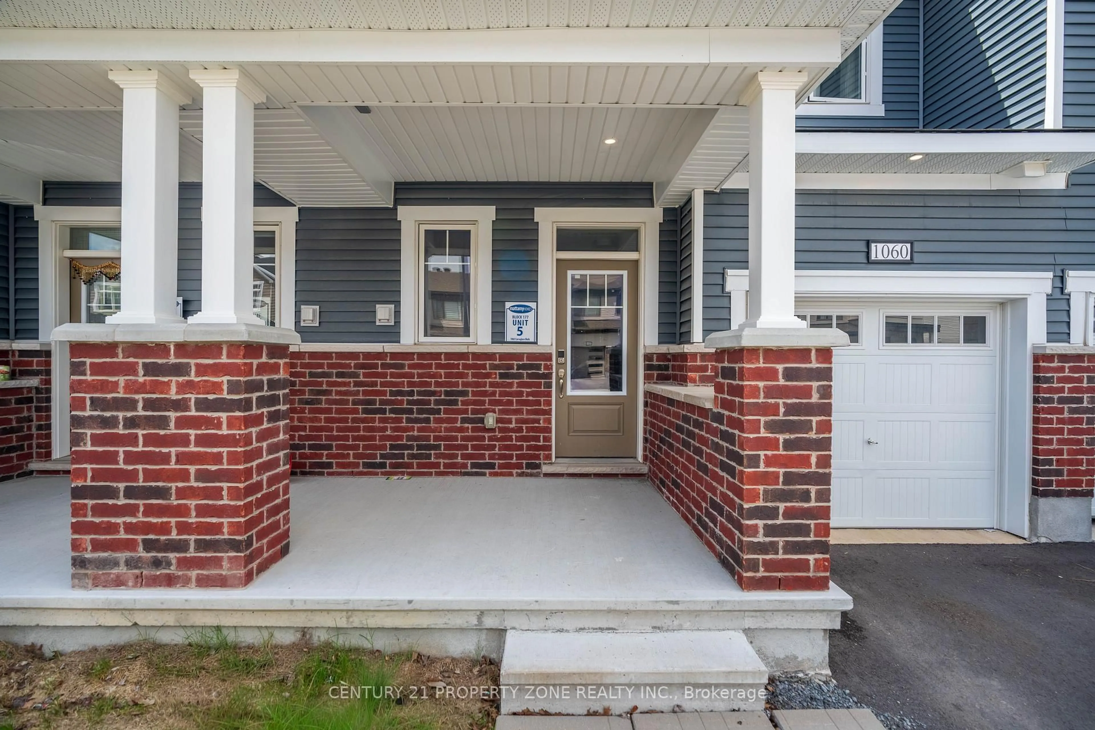 Home with brick exterior material, street for 1060 Curraglass Walk, Stittsville Ontario K2S 2A4