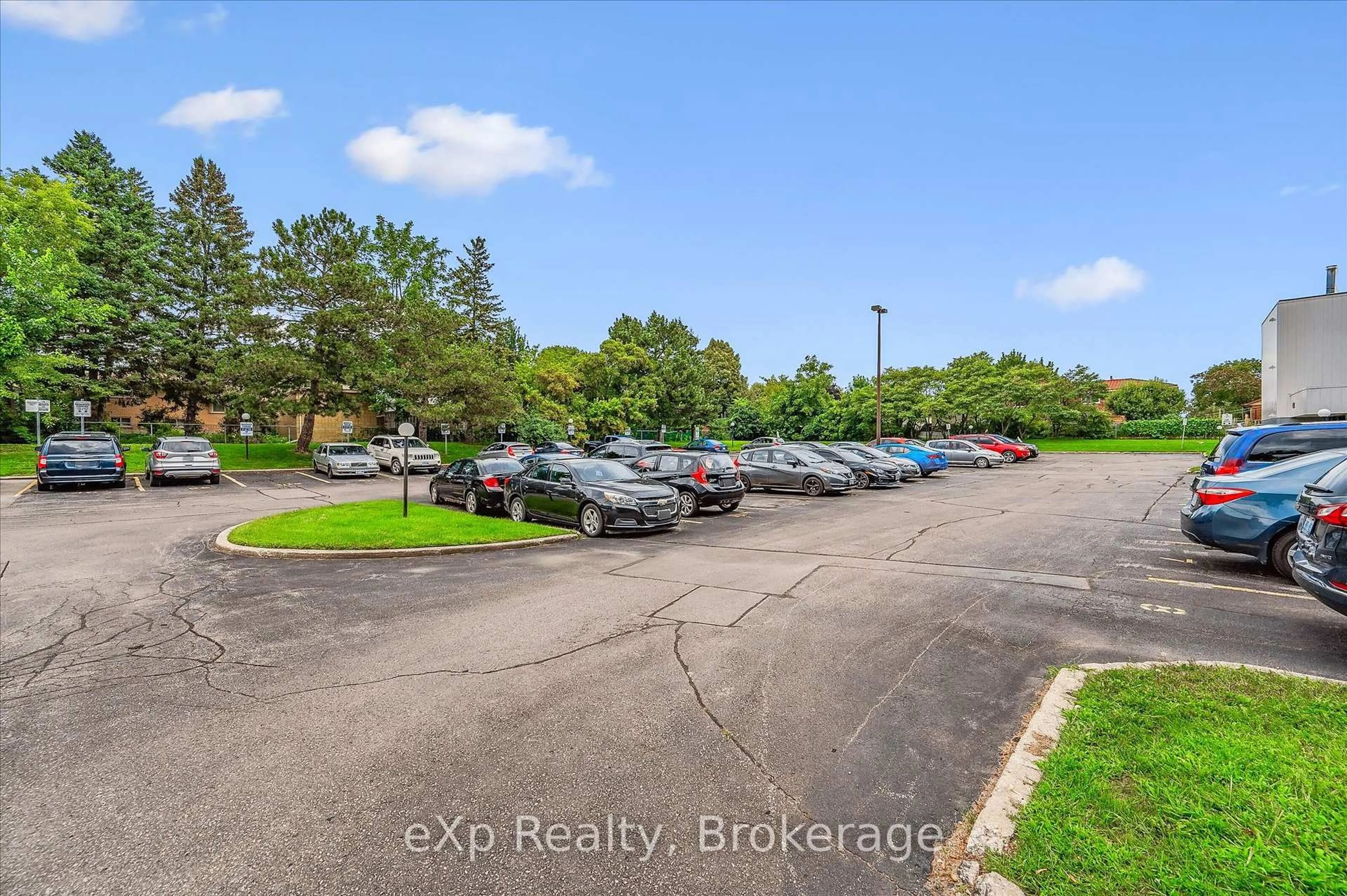 A pic from outside/outdoor area/front of a property/back of a property/a pic from drone, unknown for 65 Silvercreek Pkwy #404, Guelph Ontario N1H 7R9