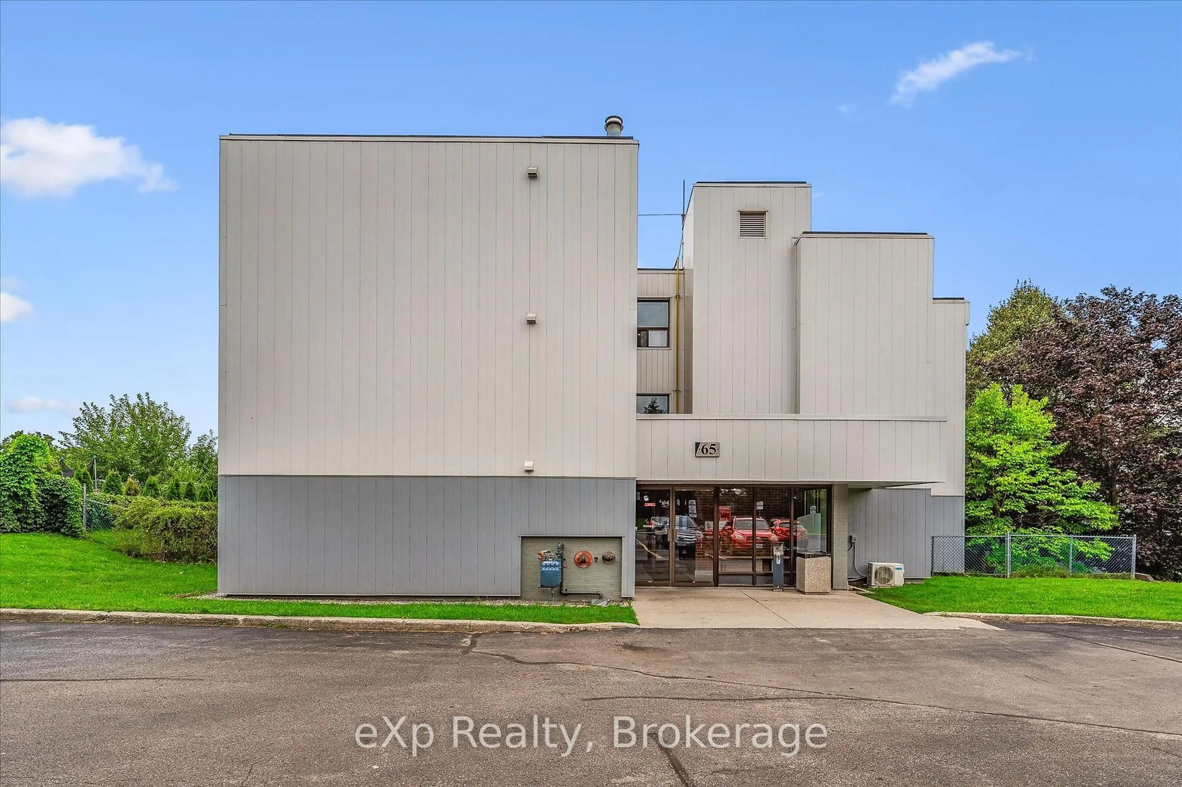 A pic from outside/outdoor area/front of a property/back of a property/a pic from drone, building for 65 Silvercreek Pkwy #404, Guelph Ontario N1H 7R9