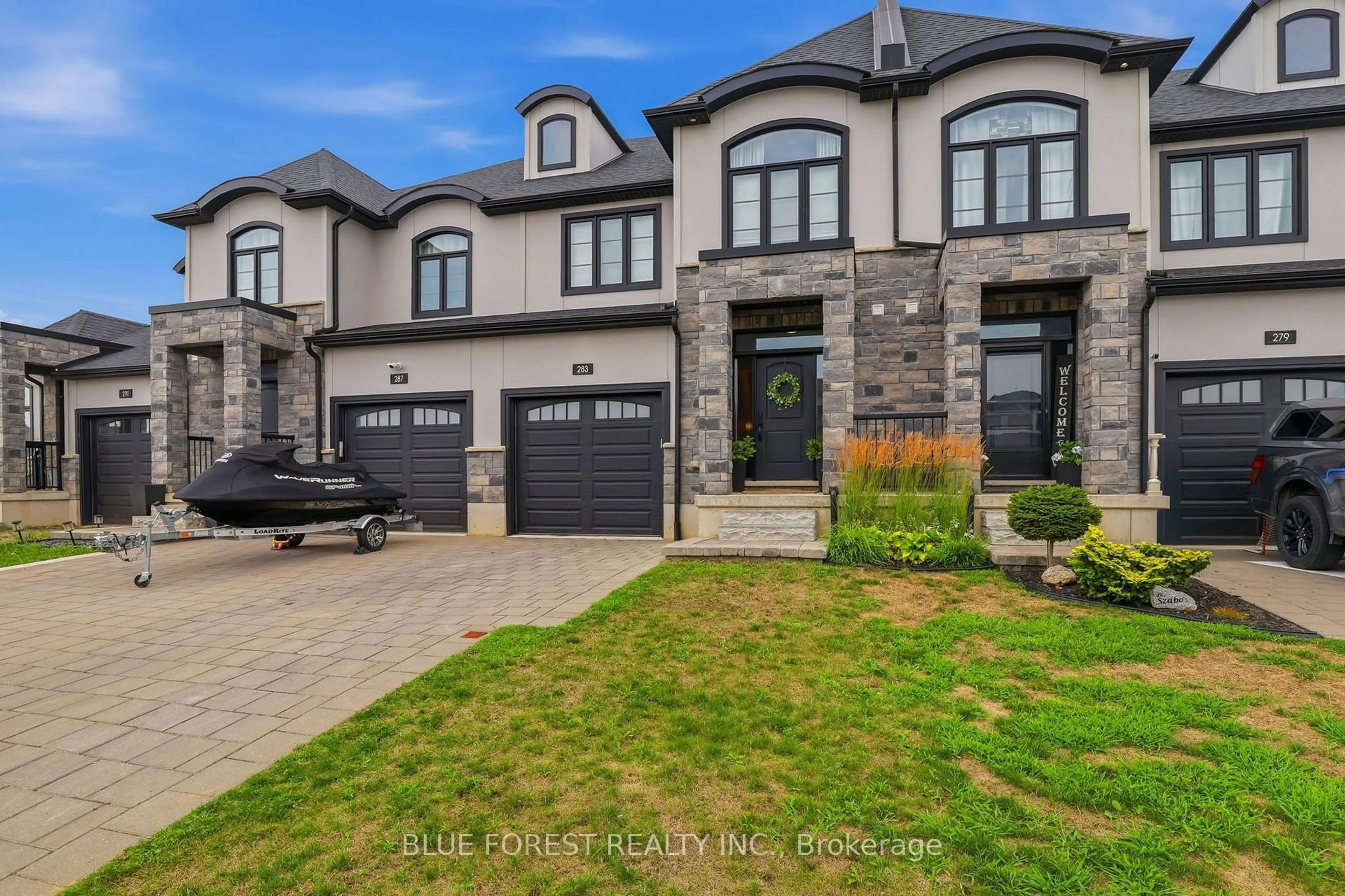 Home with brick exterior material, street for 283 Winlow Way, Middlesex Centre Ontario N0L 1R0