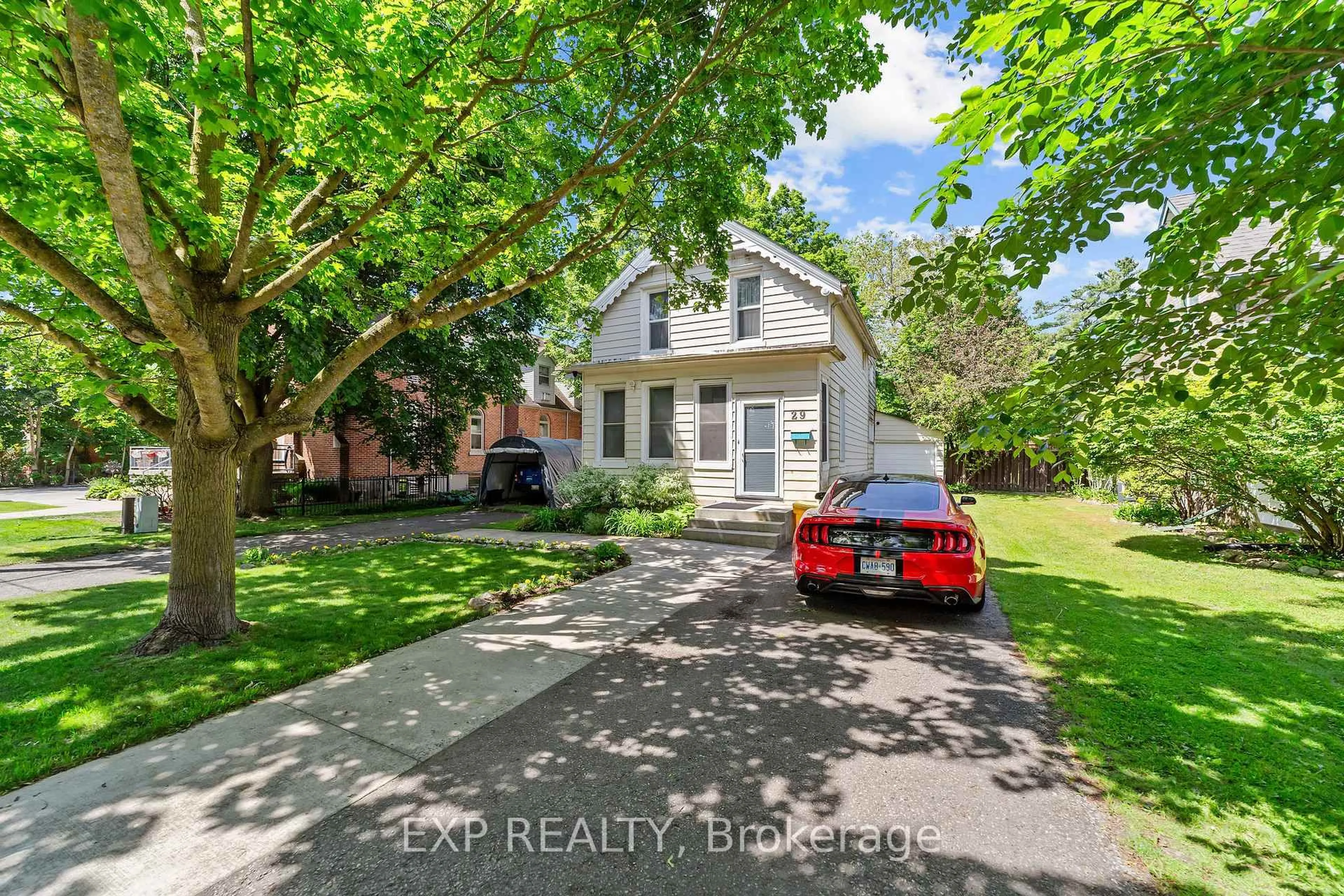 A pic from outside/outdoor area/front of a property/back of a property/a pic from drone, street for 29 Winniett St, Woodstock Ontario N4S 5Z4
