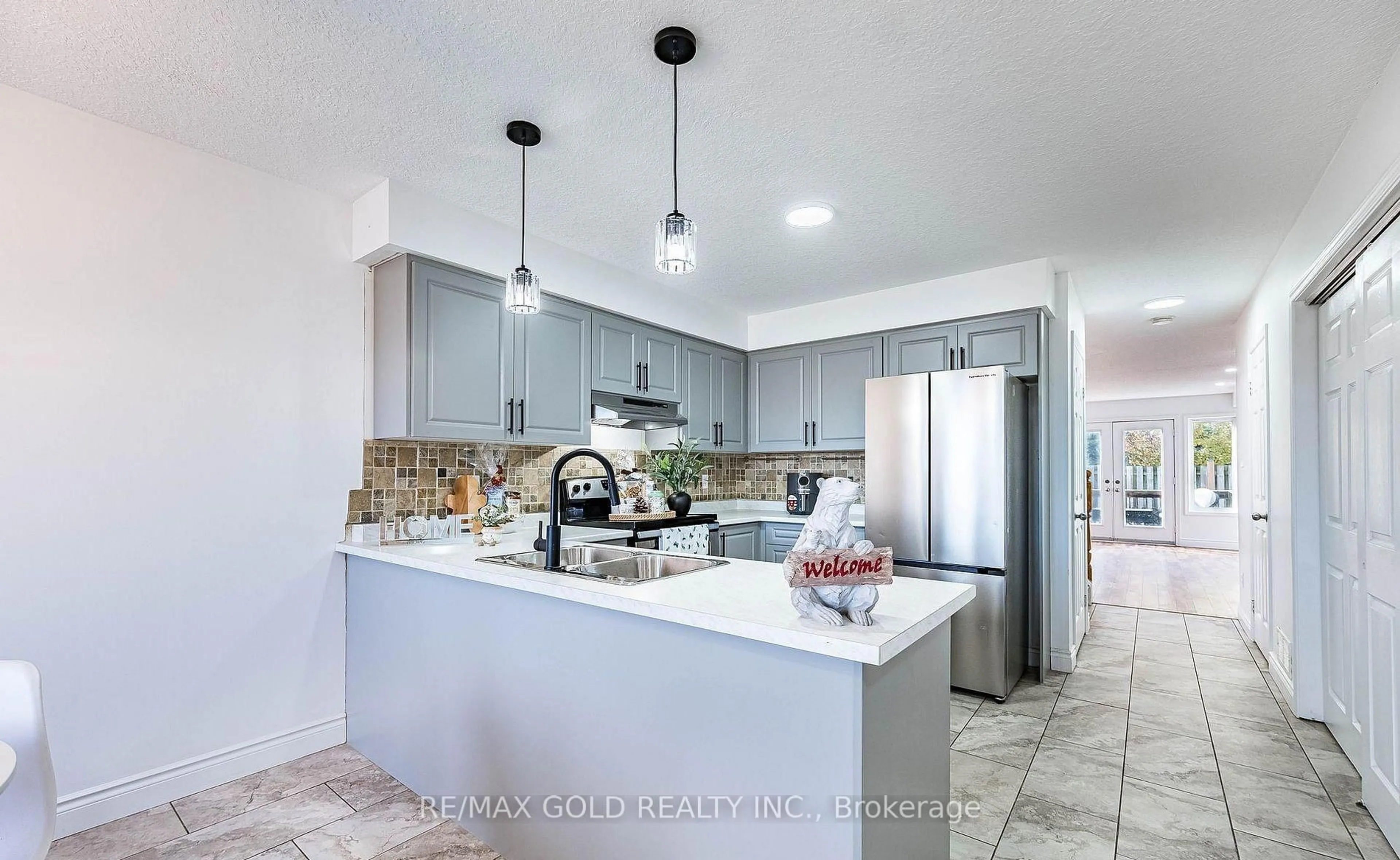 Open concept kitchen, ceramic/tile floor for 50 Howe Dr #5A, Kitchener Ontario N2E 0A3