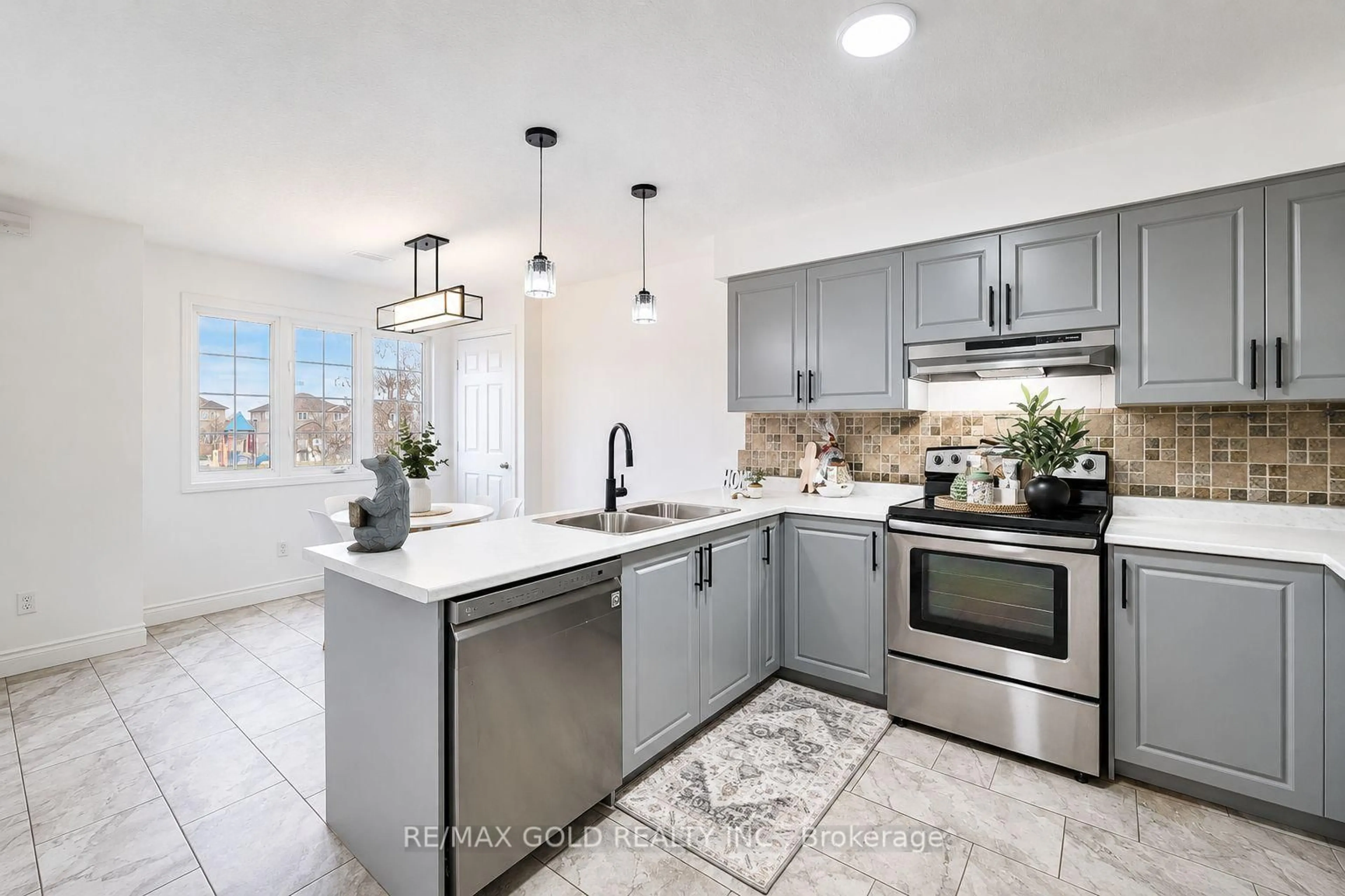 Open concept kitchen, ceramic/tile floor for 50 Howe Dr #5A, Kitchener Ontario N2E 0A3