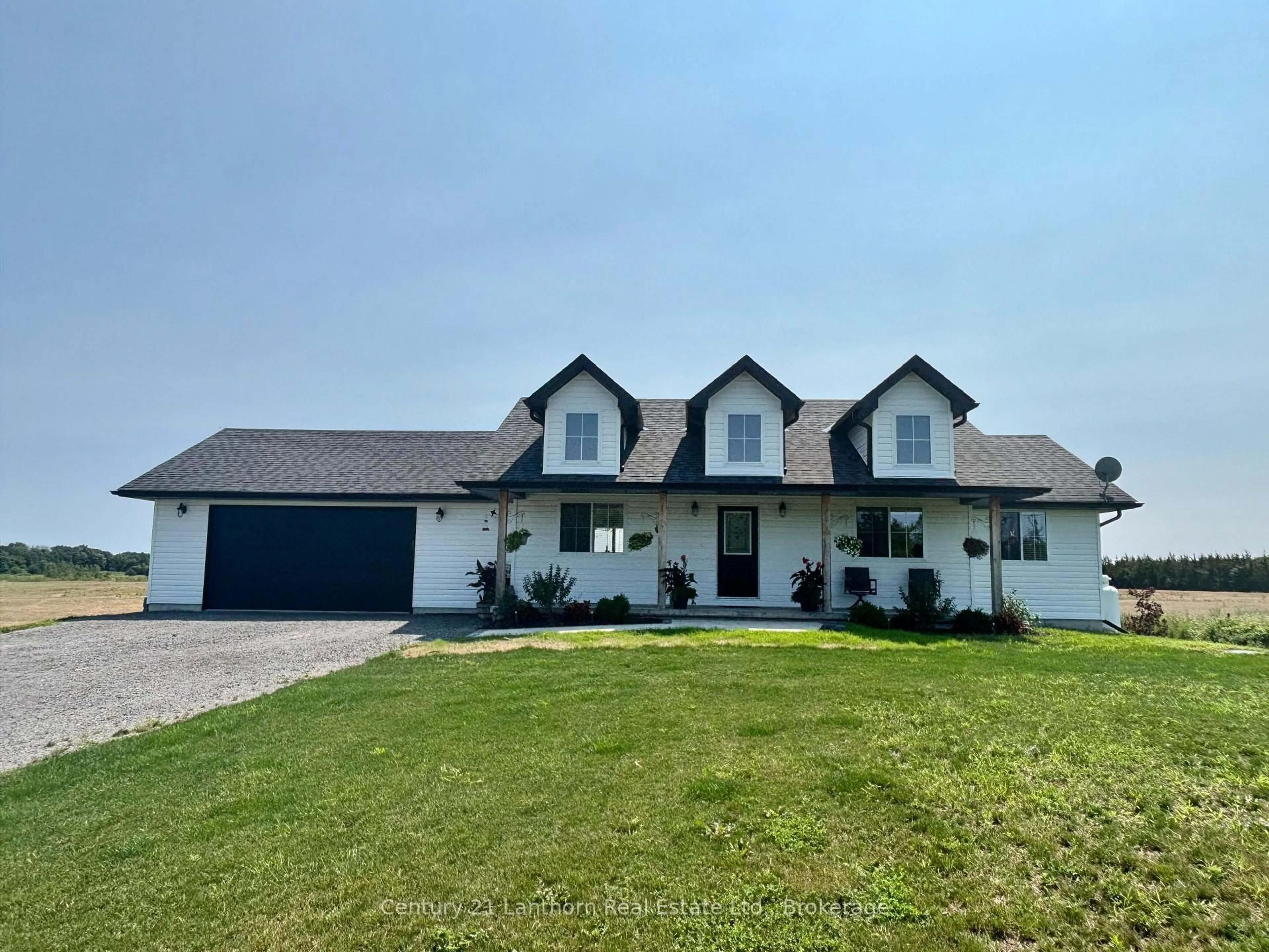 A pic from outside/outdoor area/front of a property/back of a property/a pic from drone, street for 1232 County Road 7, Prince Edward County Ontario K0K 2T0