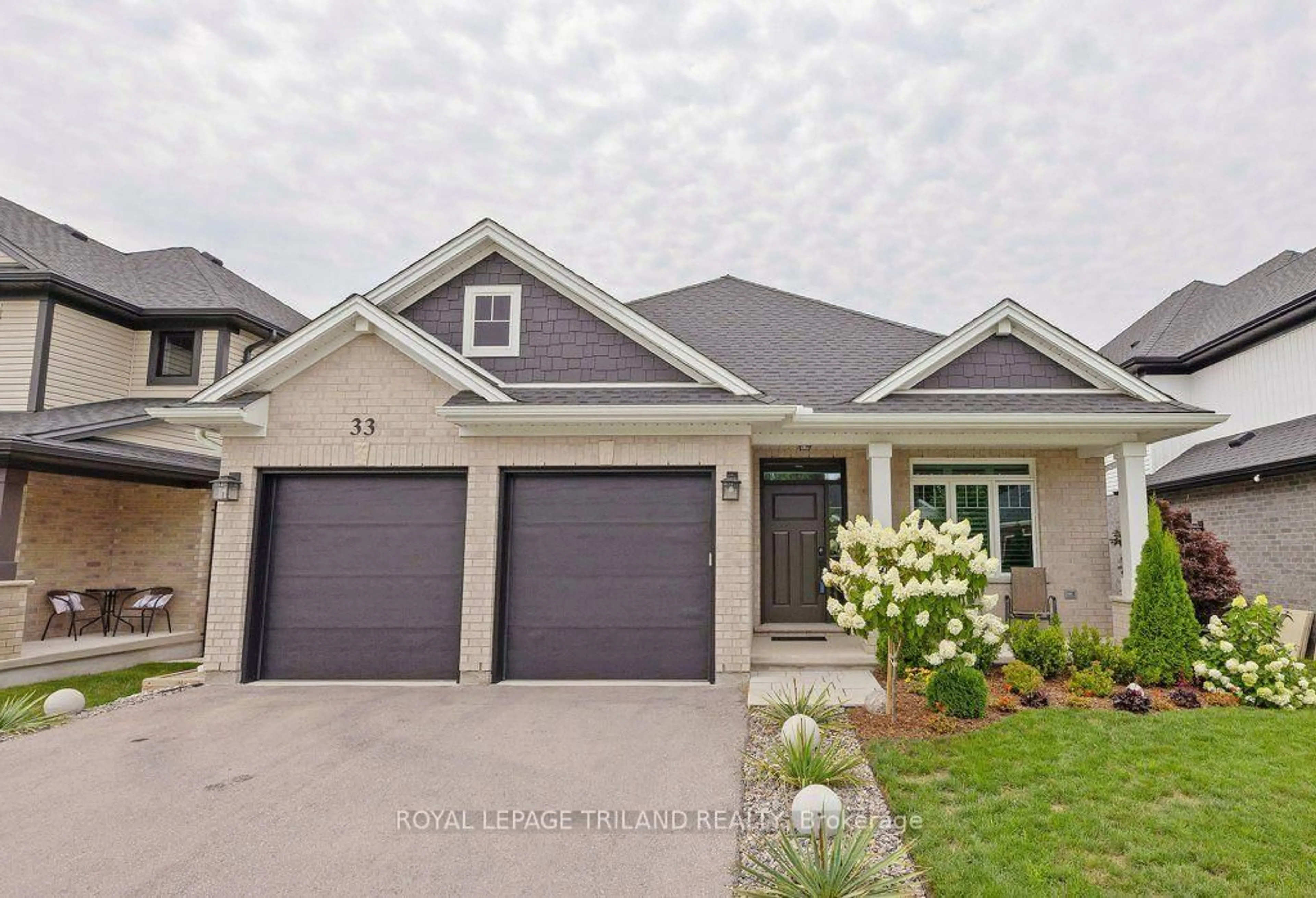 Home with brick exterior material, street for 33 White Tail Path, St. Thomas Ontario N5R 0M8