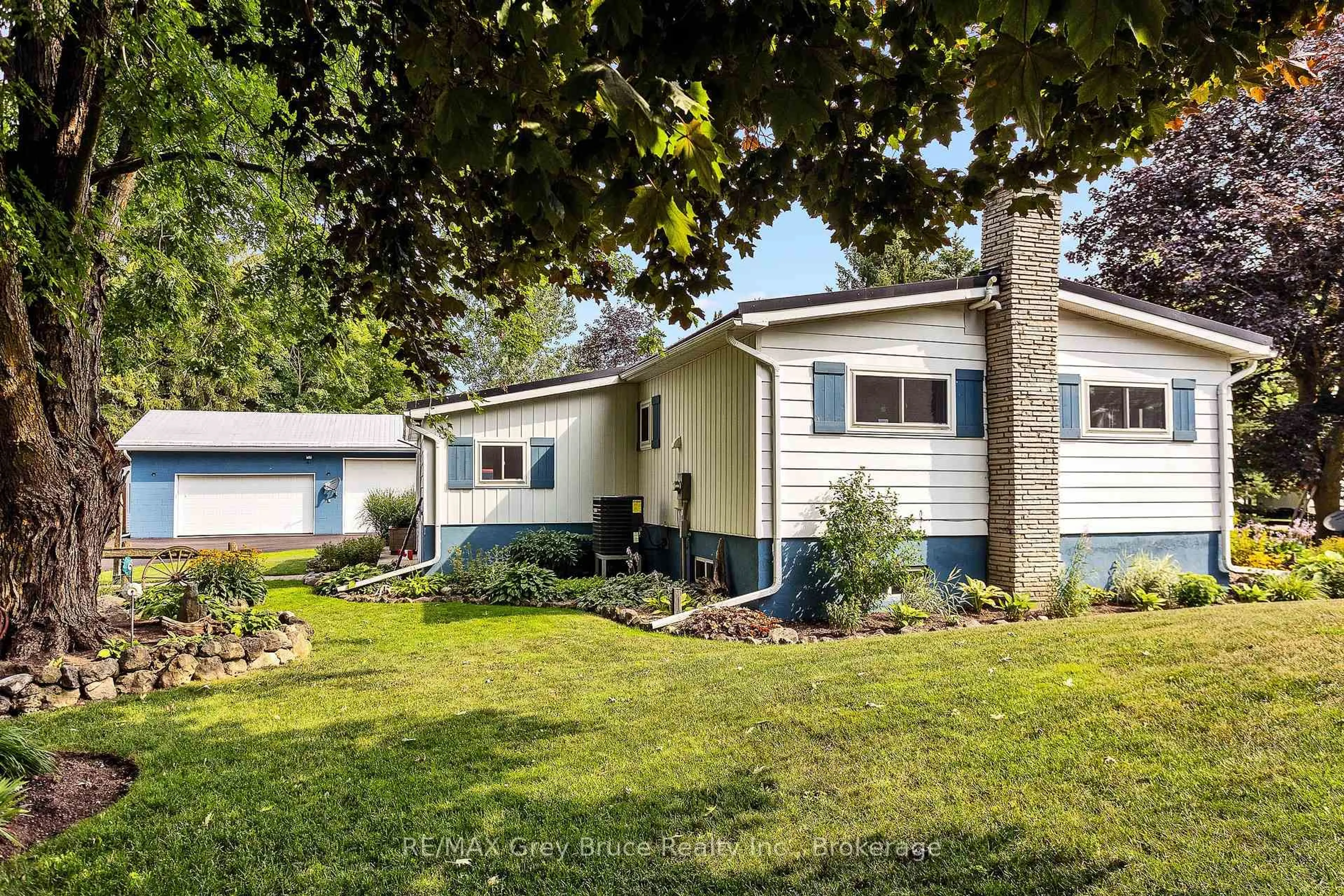 Home with vinyl exterior material, street for 21571 Grey Rd 16 Rd, Georgian Bluffs Ontario N0H 2N0