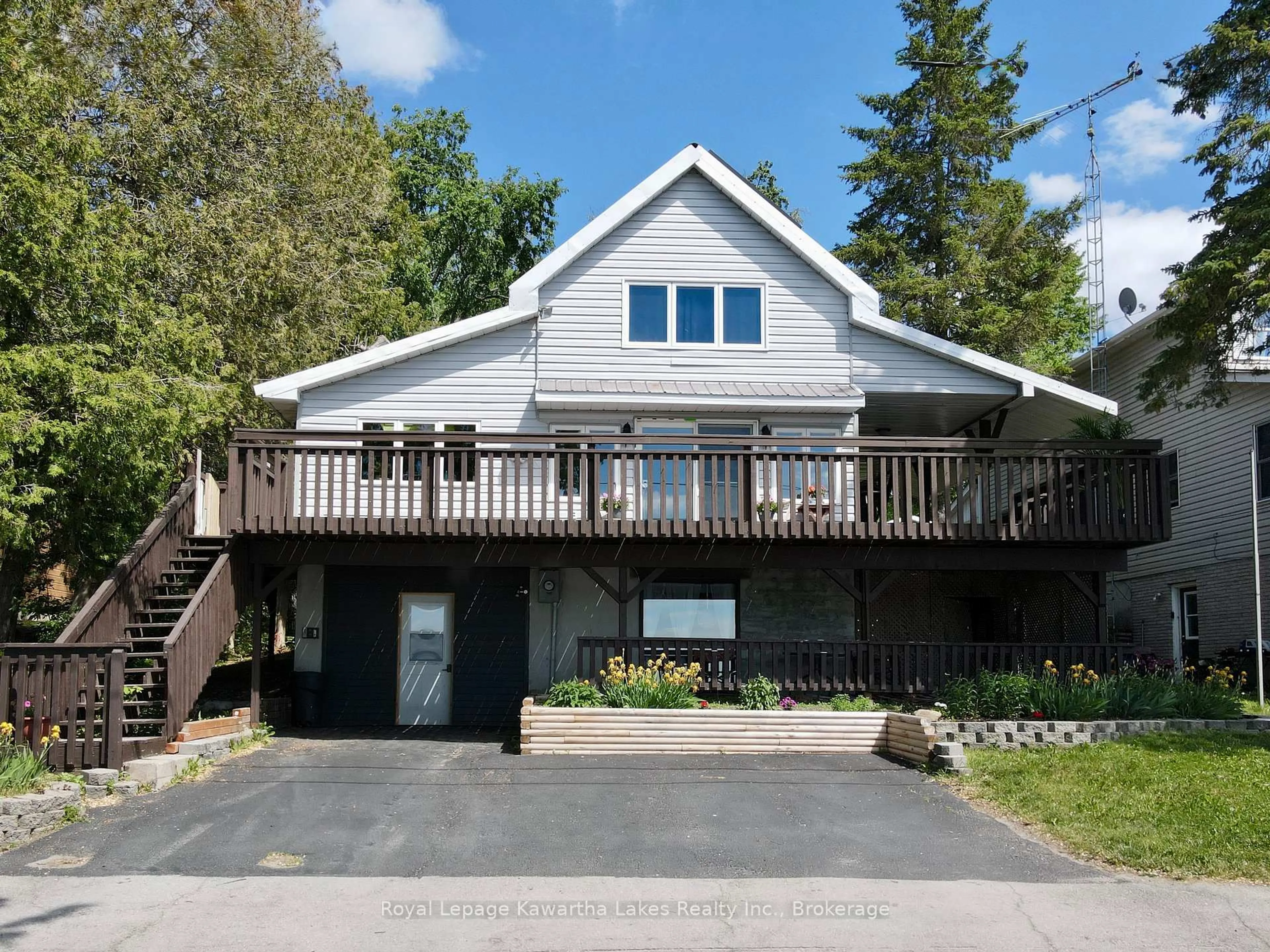 A pic from outside/outdoor area/front of a property/back of a property/a pic from drone, water/lake/river/ocean view for 67 Hazel St, Kawartha Lakes Ontario K0M 1L0