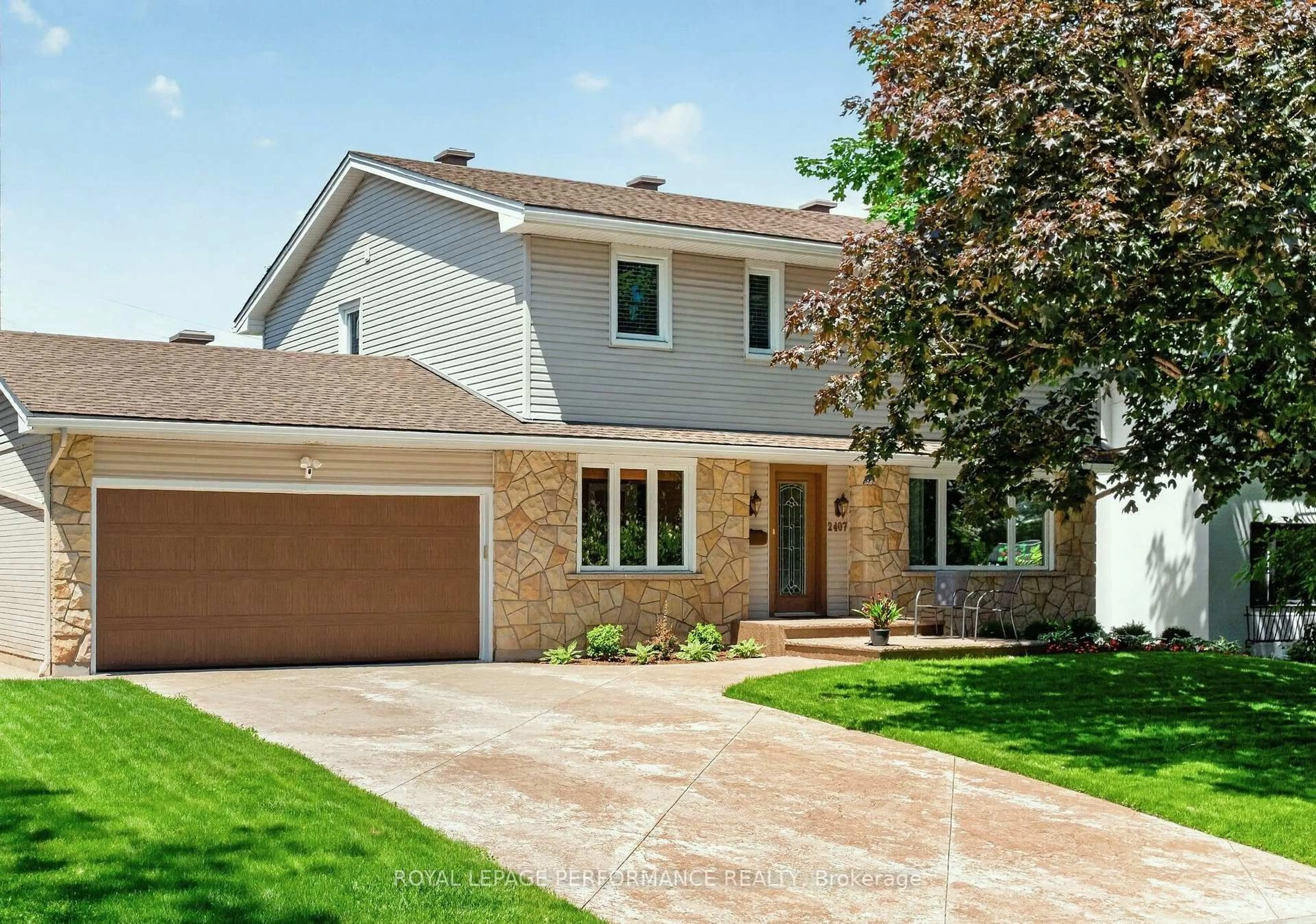 Home with brick exterior material, street for 2407 Rosewood Ave, Ottawa Ontario K2B 7L3