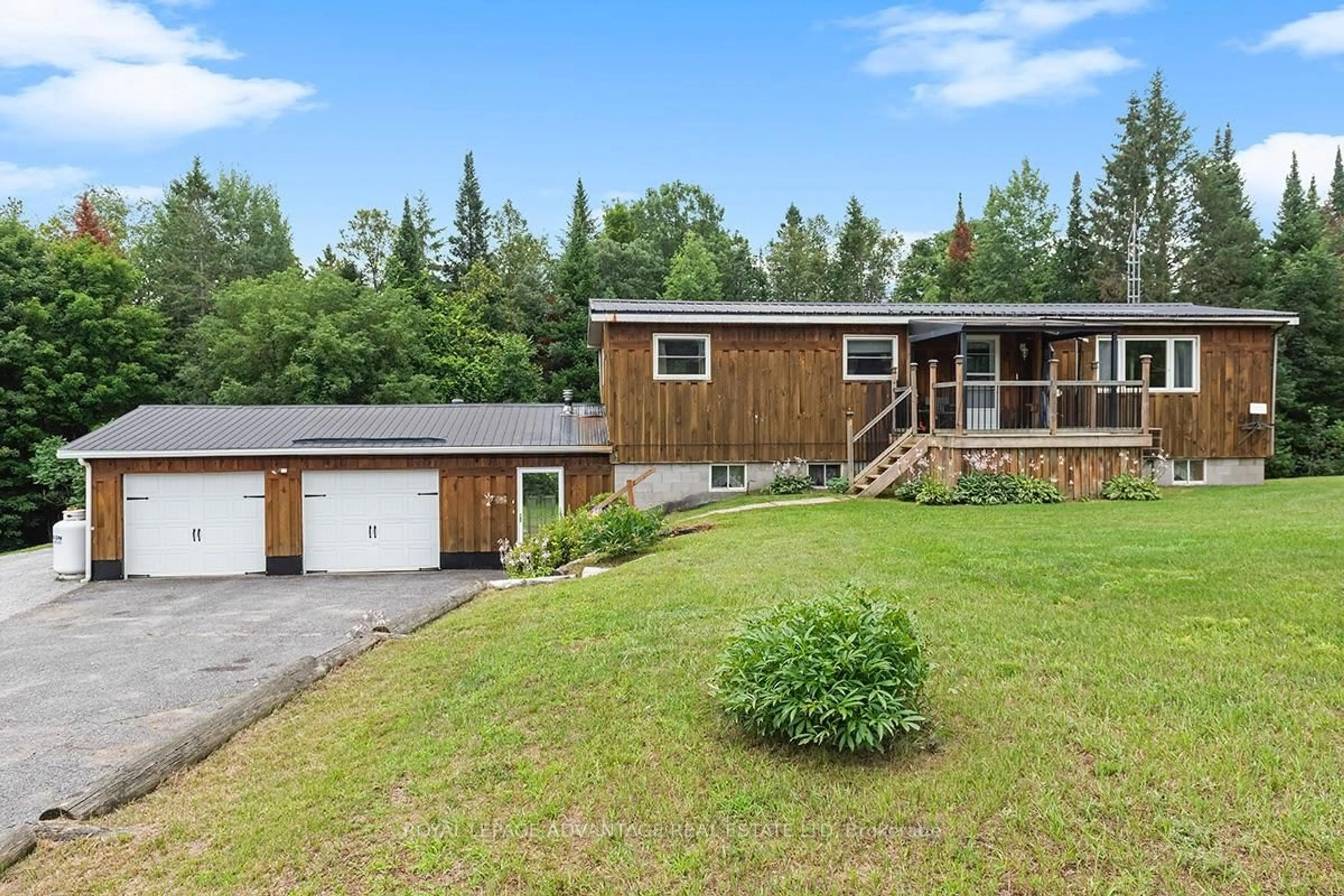 A pic from outside/outdoor area/front of a property/back of a property/a pic from drone, mountain view for 4865 Wolf Grove Rd, Lanark Ontario K0G 1K0